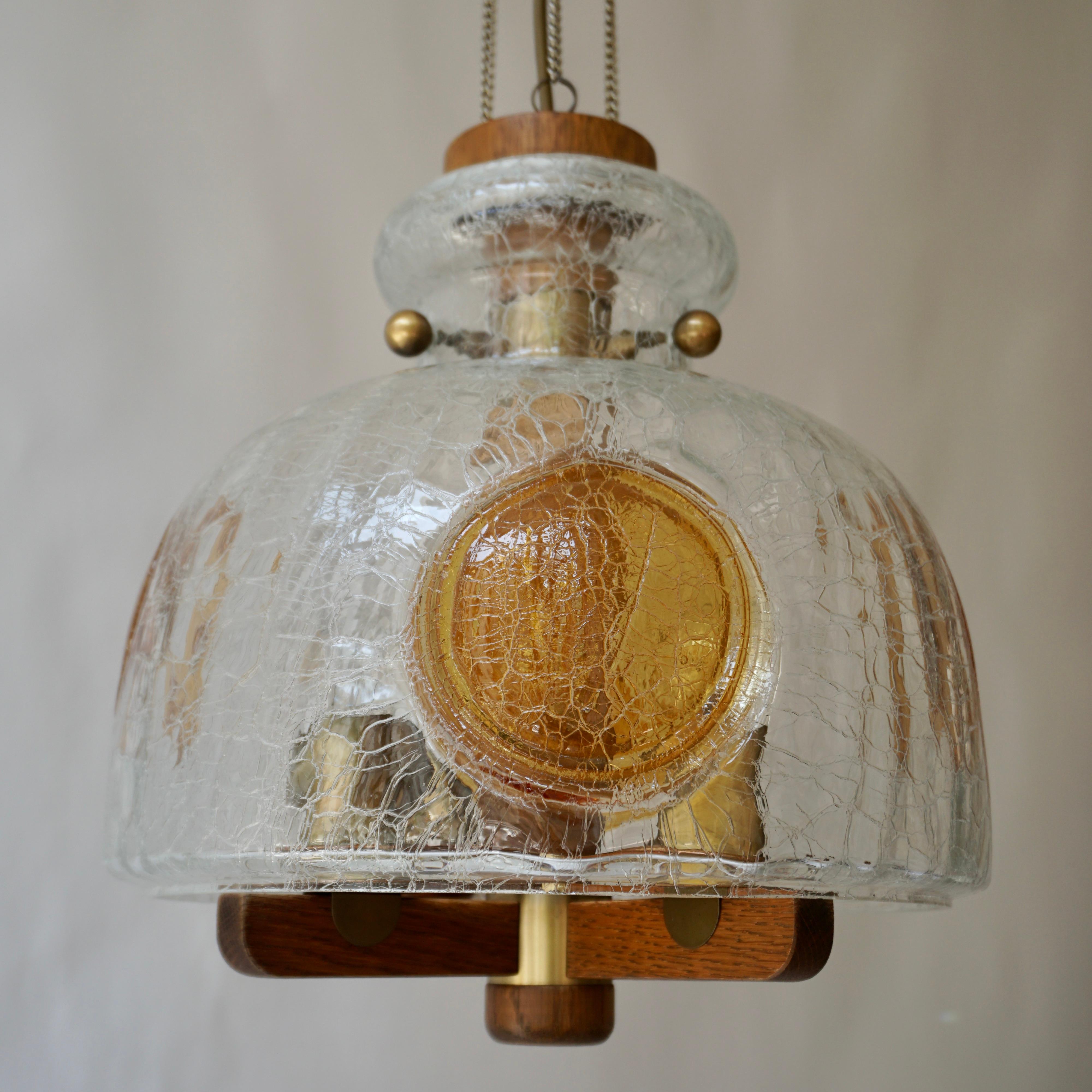 Large Italian art glass pendant.  

There is something fresh and stylish about the midcentury modern era. It is that style and freshness that attracts people from all over the world to pieces from this time period. Whenever we 'run into' a