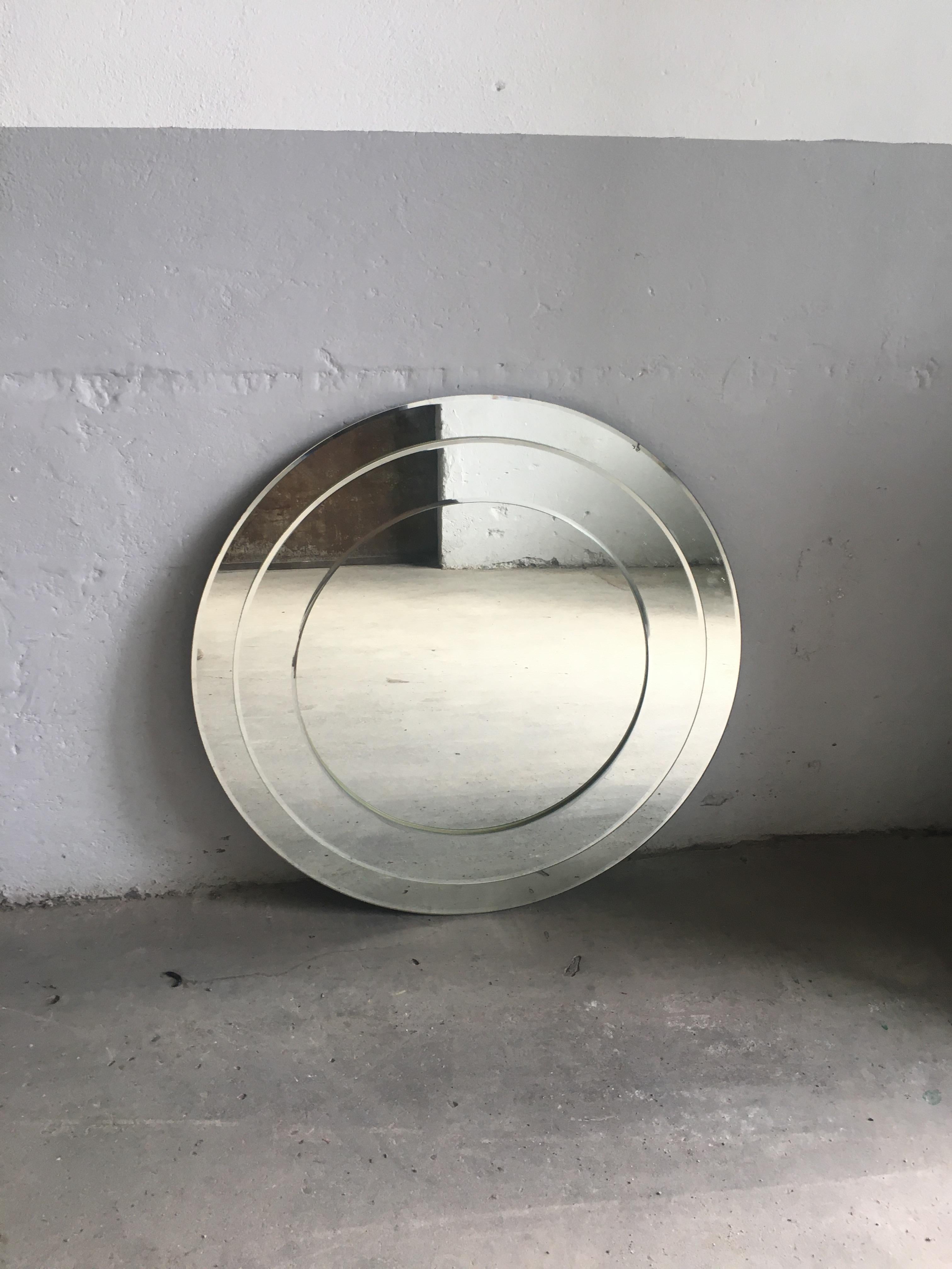 Mid-Century Modern Italian crystal art round shaped mirror. This mirror is composed by three mirror put one on other.