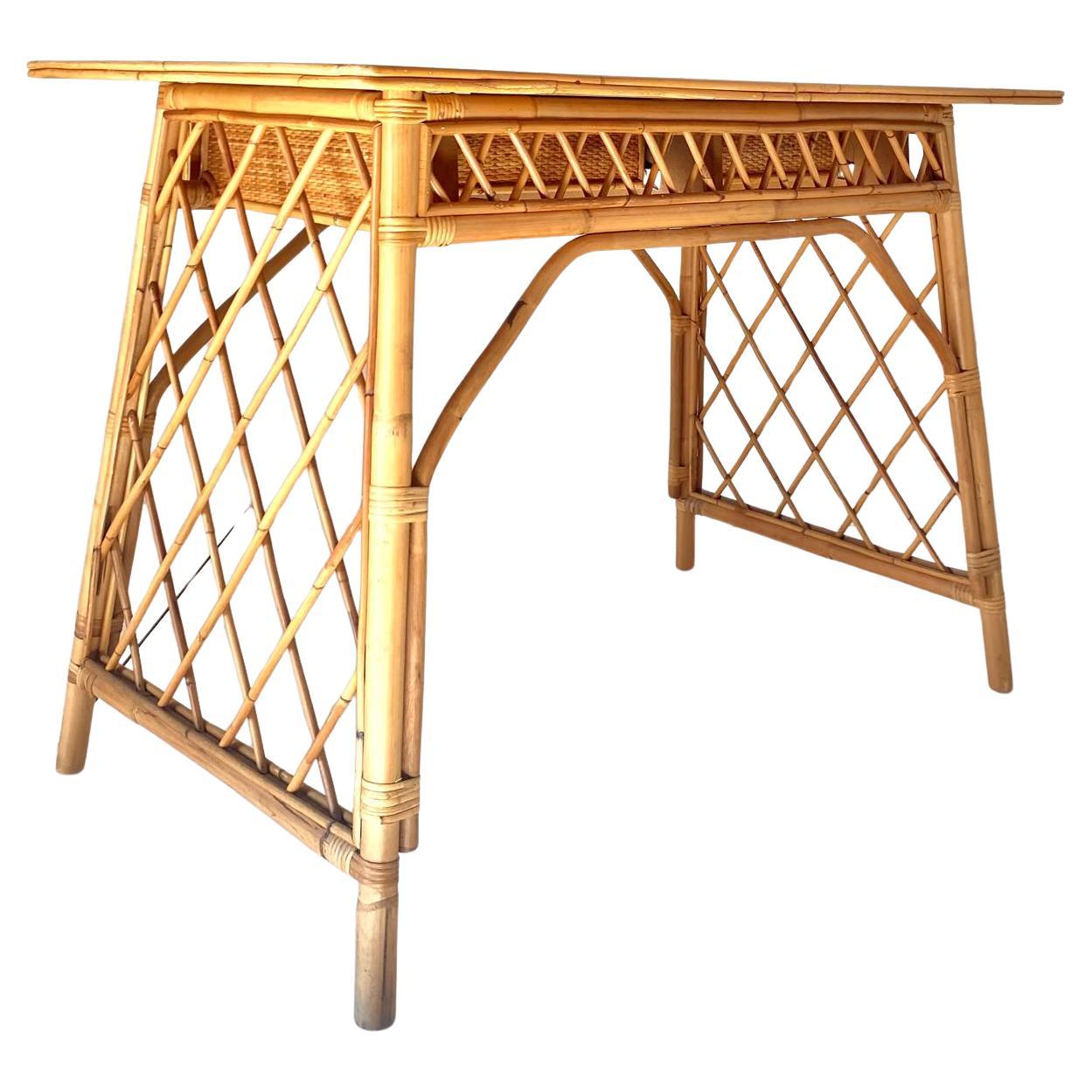 Vintage Italian Desk in Bamboo in the style of Luis Sognot

Inspired by the style of Luis Sognot, the desk features a unique combination of bamboo and rattan, showcasing the natural materials popular during the era. The top is made of aqua green
