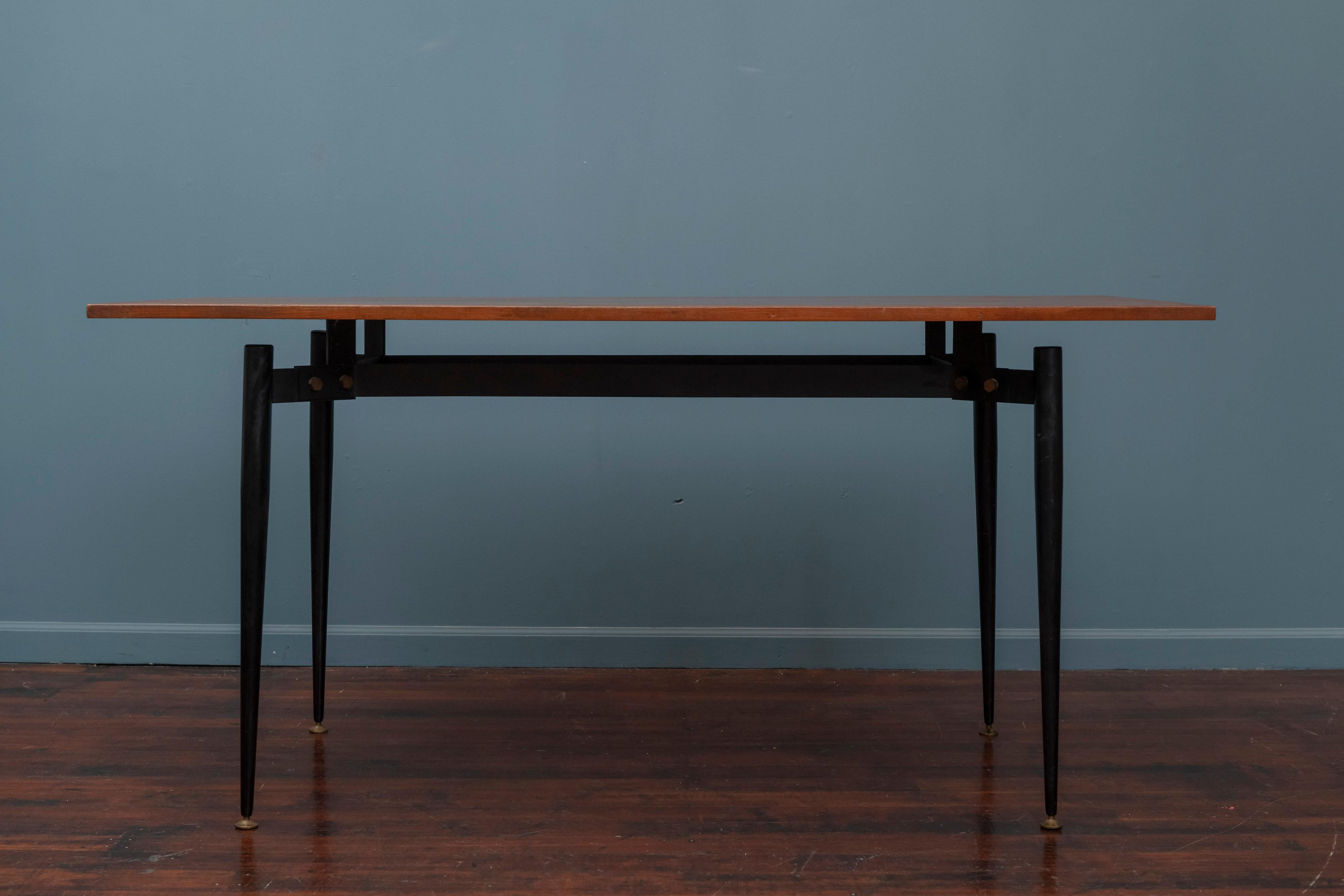 Mid-Century Modern Italian small dining table or desk with an interesting steel framed base and a floating teak top.