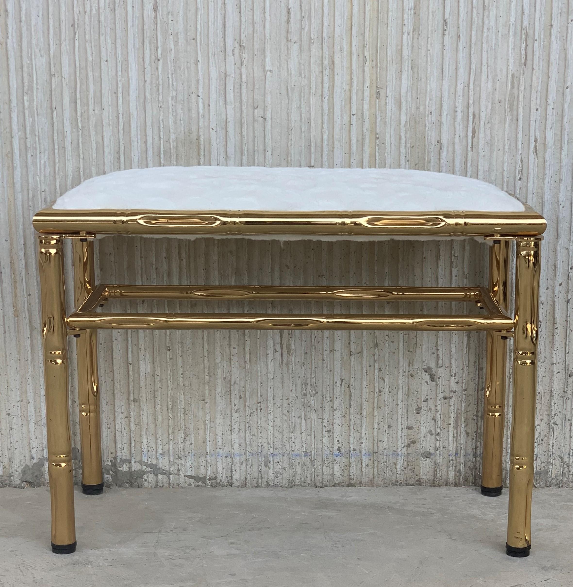 Mid-Century Modern Italian faux bamboo gilt metal bench with white velvet upholstery.