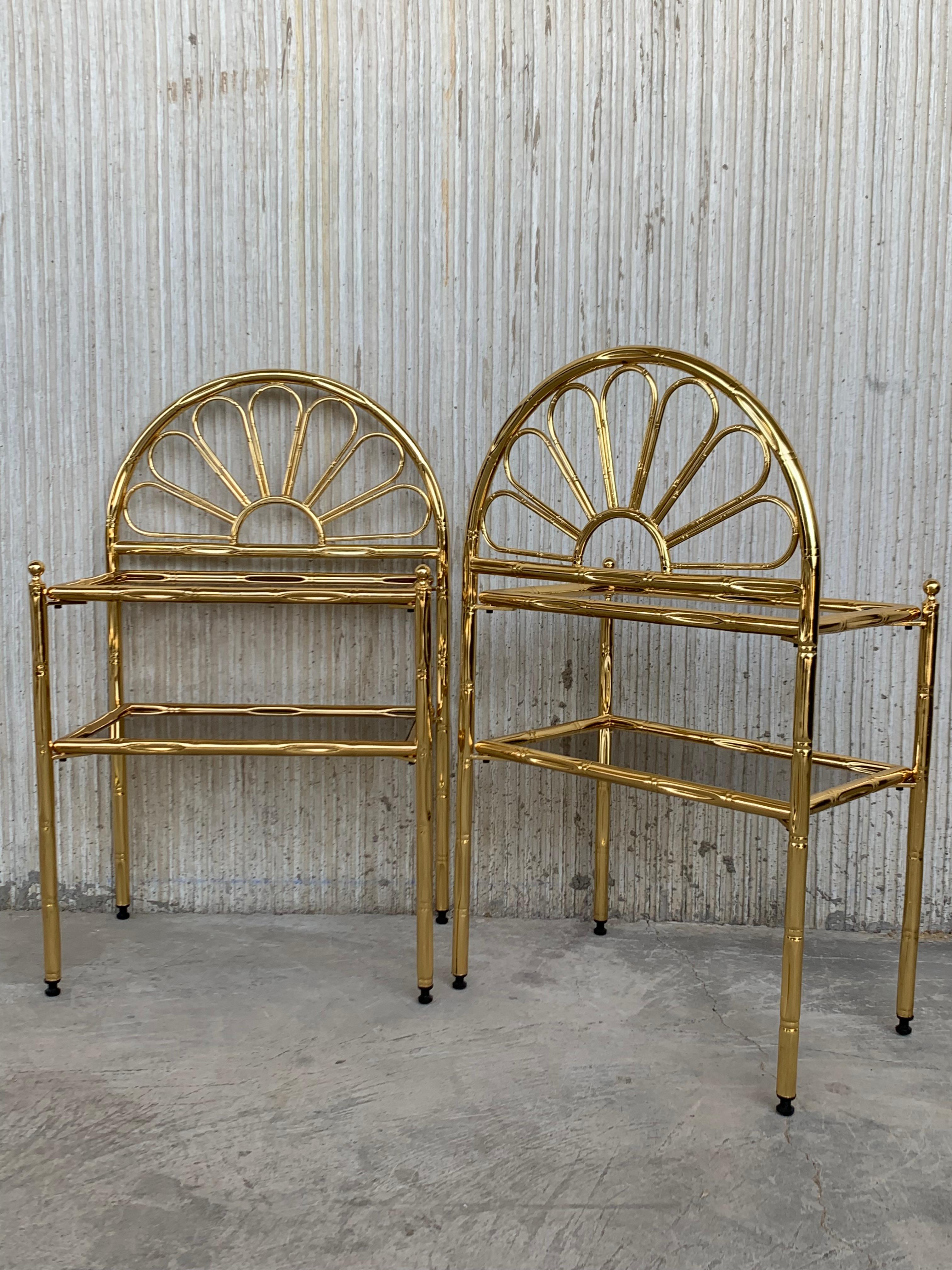 Mid-Century Modern Italian Faux Bamboo Gilt Metal NightStands with Smoked Glass

Total Height: 31in
Height to high shelve: 20.47in 
Height to the low shelves: 12.6in