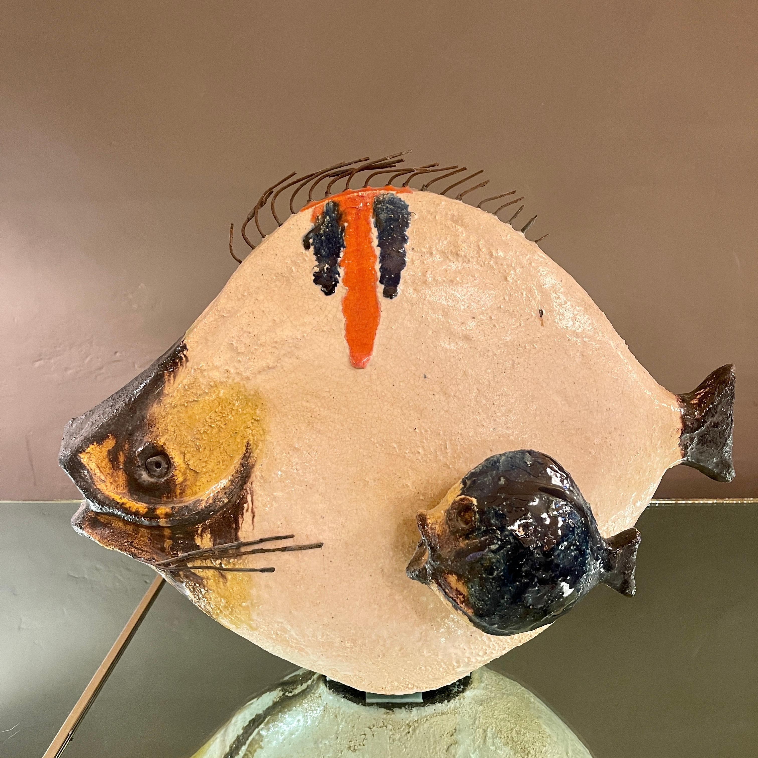Italian glazed ceramic fish sculpture by the eccentric ceramics genius Ivo De Santis for his Gli Etruschi pottery (1950 to 1980) in Florence. Unsigned piece.
A friend of Marcello Fantoni (also of Florence), Ivo De Santis' pottery compares