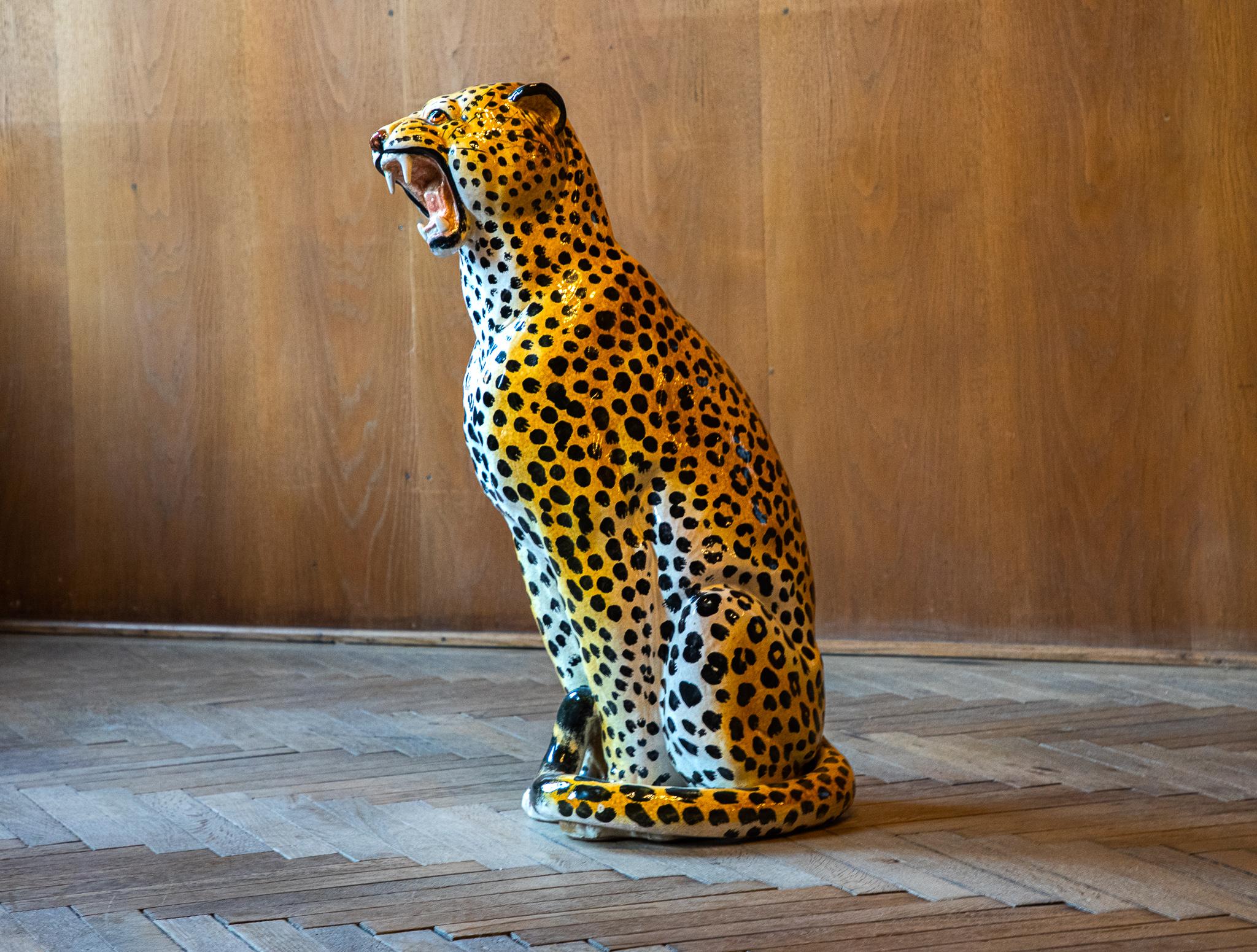 Mid-Century Modern Italian glazed ceramic leopard sculpture, Italy 1970s.

This extraordinary Italian ceramic Leopard sculpture from the 70s is one of the most fierce statement pieces! Nowadays you find them back in contemporary and eclectic