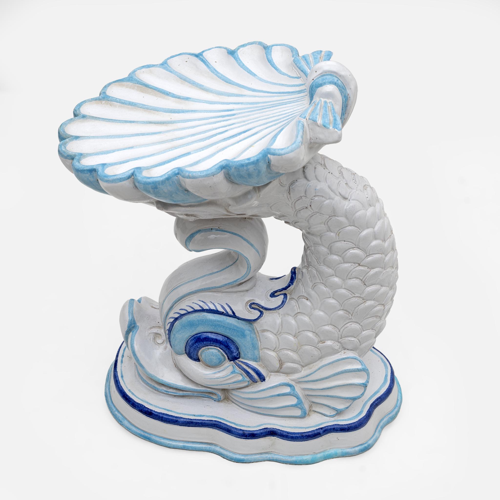 This Palm Beach inspired Italian terracotta stool or coffee table is a true beauty. It dates back to the 1960s and is in excellent vintage condition. The light blue and white painted enamel is gorgeous and would make a great piece in a garden or