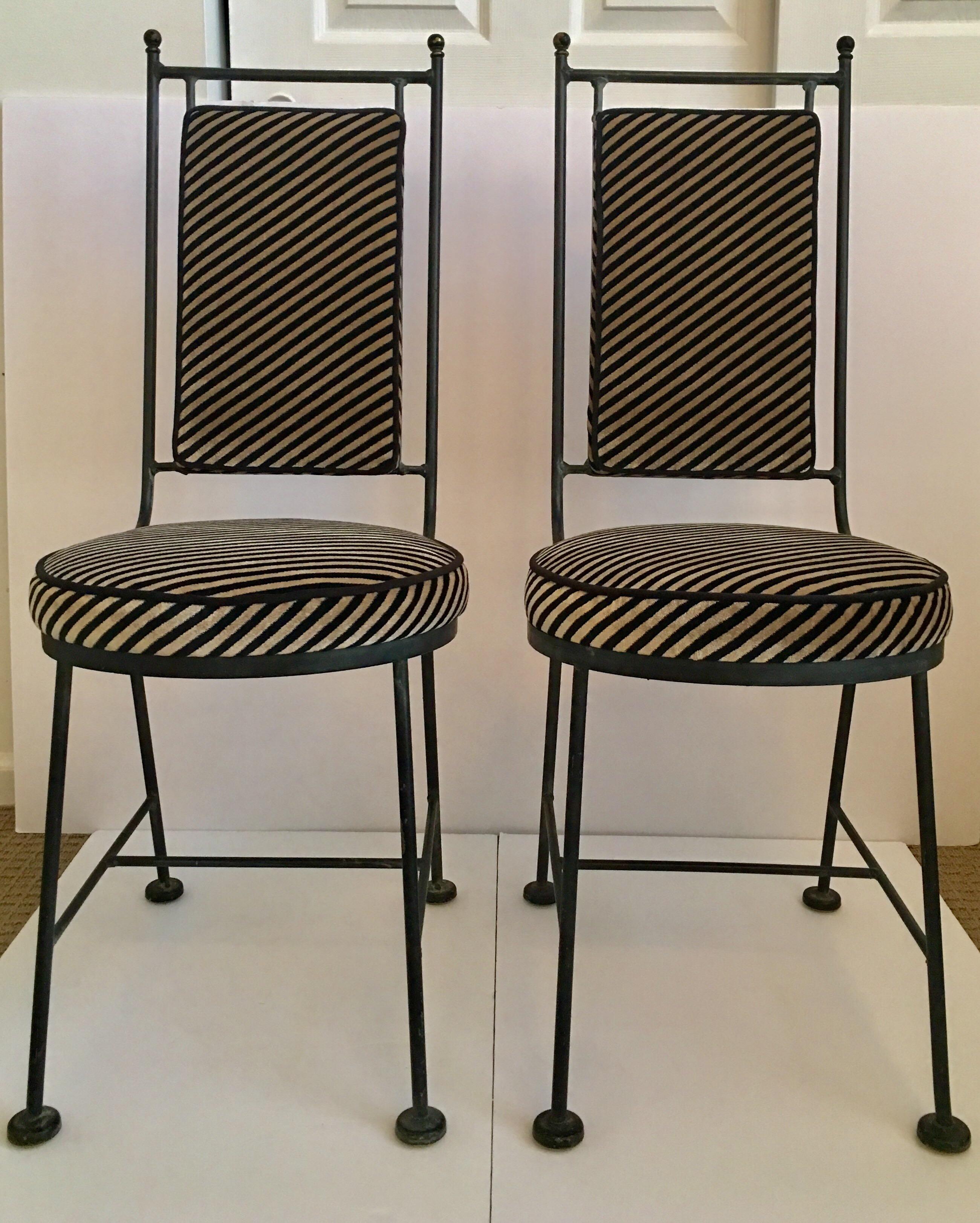 Midcentury Modern black wrought iron Savonarola style chairs custom upholstered in Kelly Wearstler Italian oblique diagonal striped velvet fabric for Groundworks. Newly upholstered geometric memphis style round seat and rectangular box back cushions