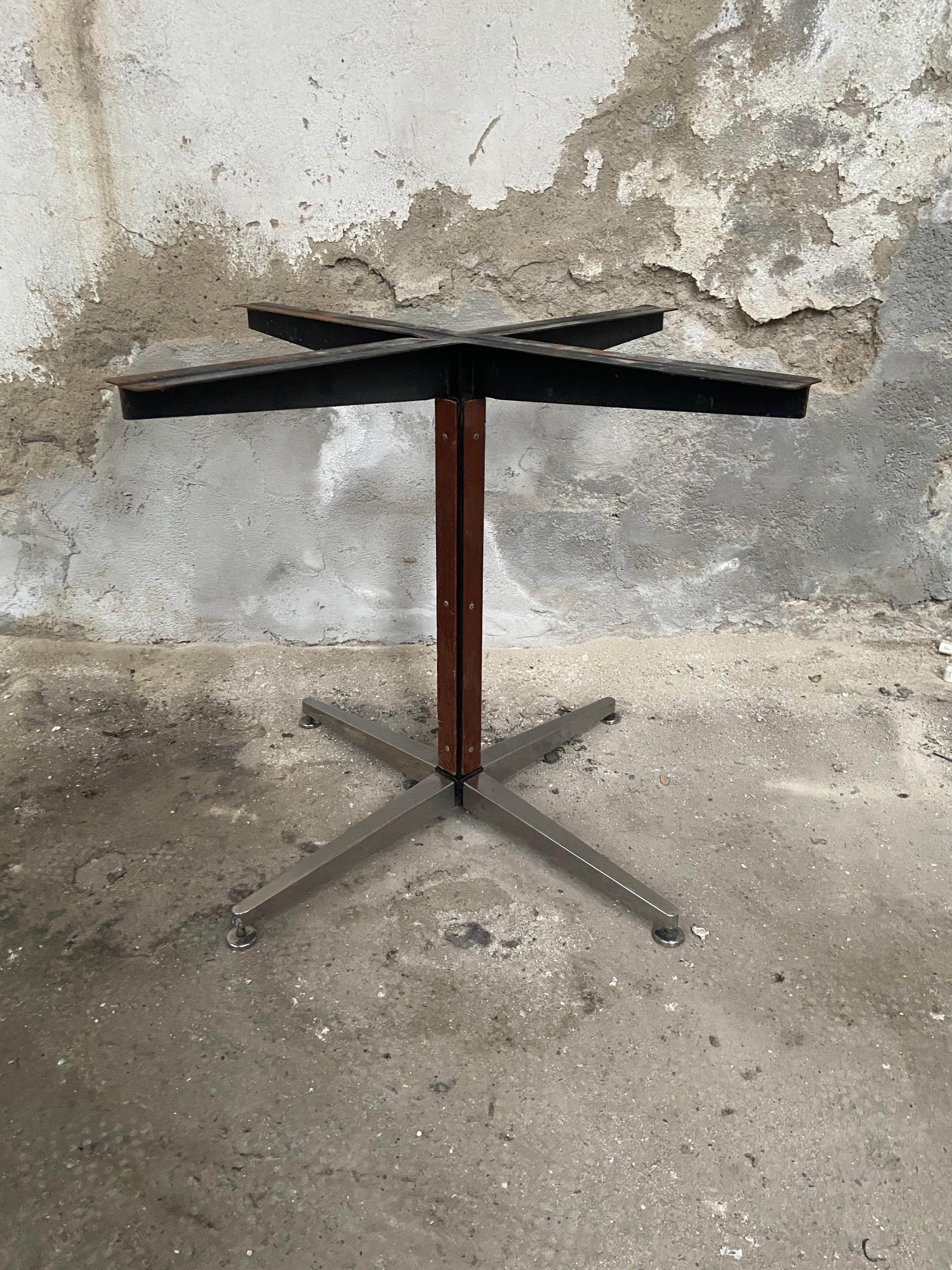 Mid-Century Modern Italian Iron Table Base with Tripode Aluminum Legs and wooden inserts. 1970s
more pieces available.