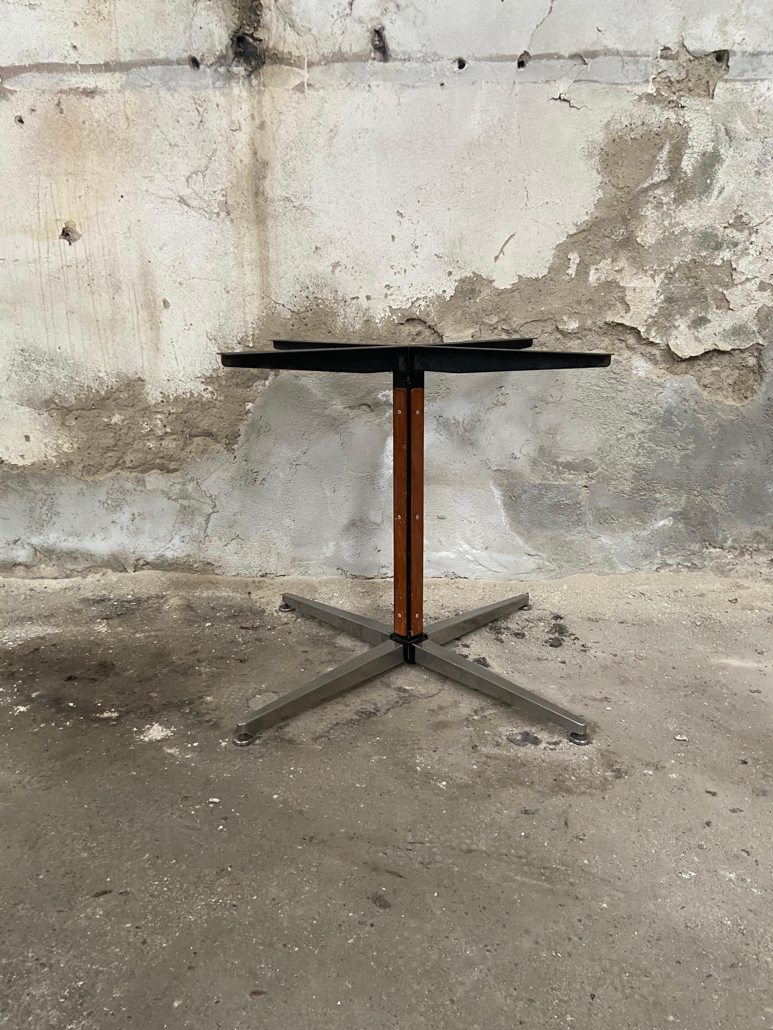 Mid-Century Modern Italian Iron Table Base with Tripode Aluminum Legs and wooden inserts. 1970s
More pieces available.