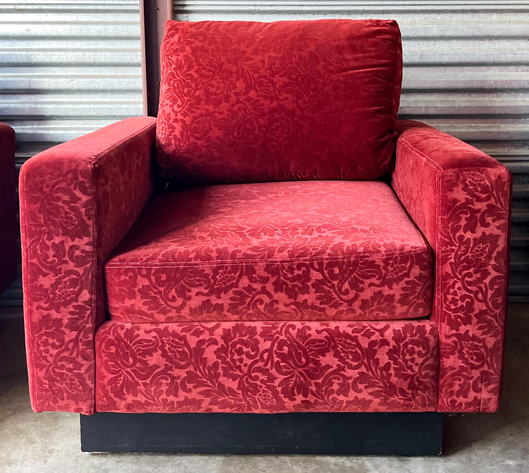 This is a pair of Italian mid-century modern club chairs by Maurice Villency. They rest on a black painted wooden plinth. The garnet velvet is original and shows wear, They do have the original labels. I have the settee as well.

My shipping is