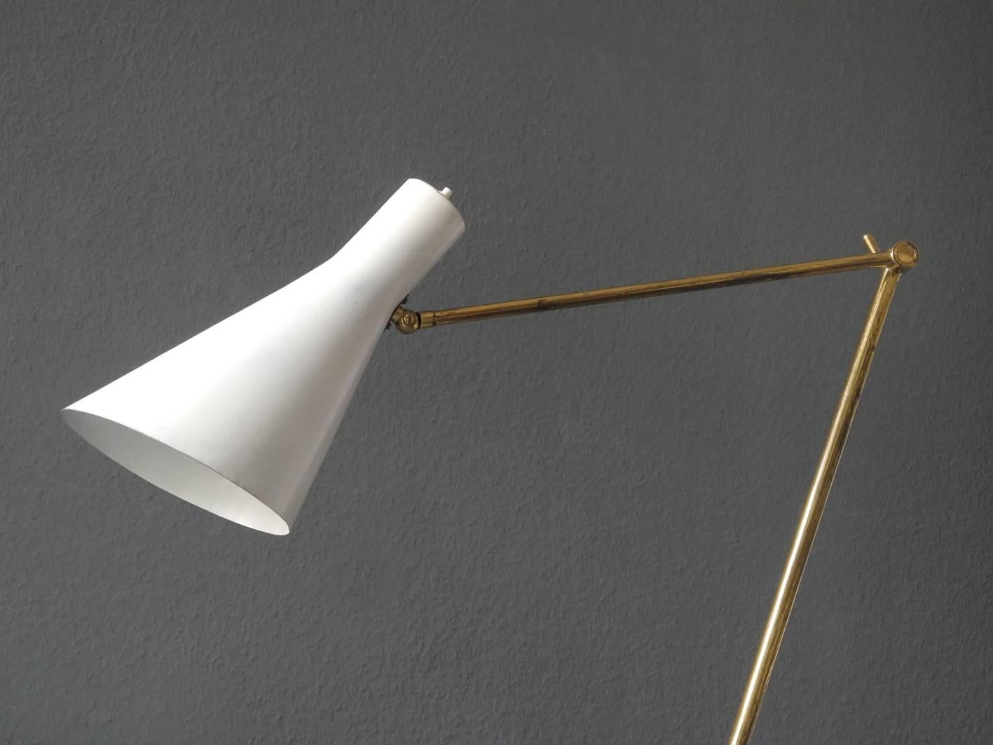 Mid-Century Modern Italian modern brass joint clamp lamp with cone shade.
Made in Italy. Beautiful minimalistic design. Very high quality.
Steplessly adjustable due to two joints. Holds in every position.
Great patina on brass, slight bumps on