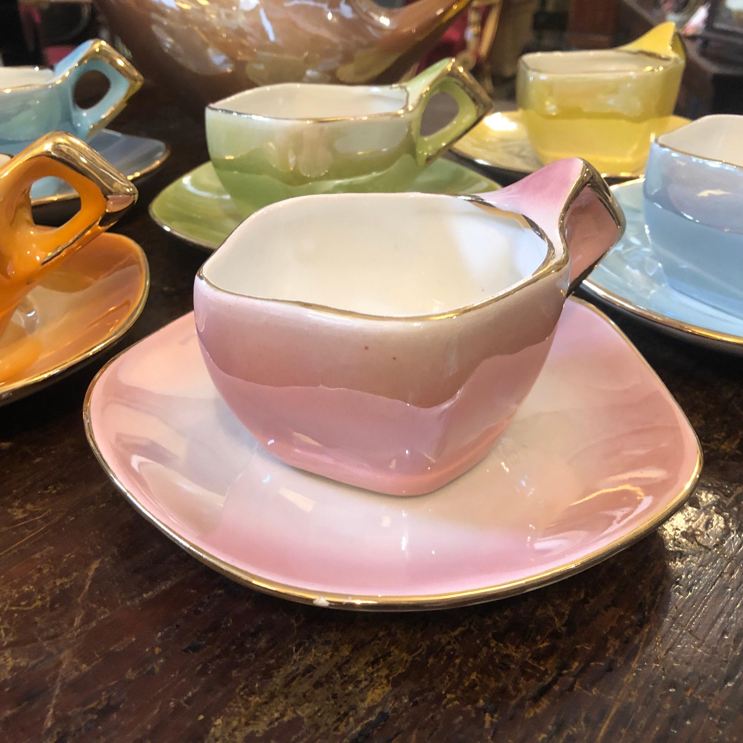 A Mid-Century Modern tea set made in Italy in the 1950s by Italo Casini. It's in perfect conditions. Measures: Diameter of the cups is 3.54 inches.