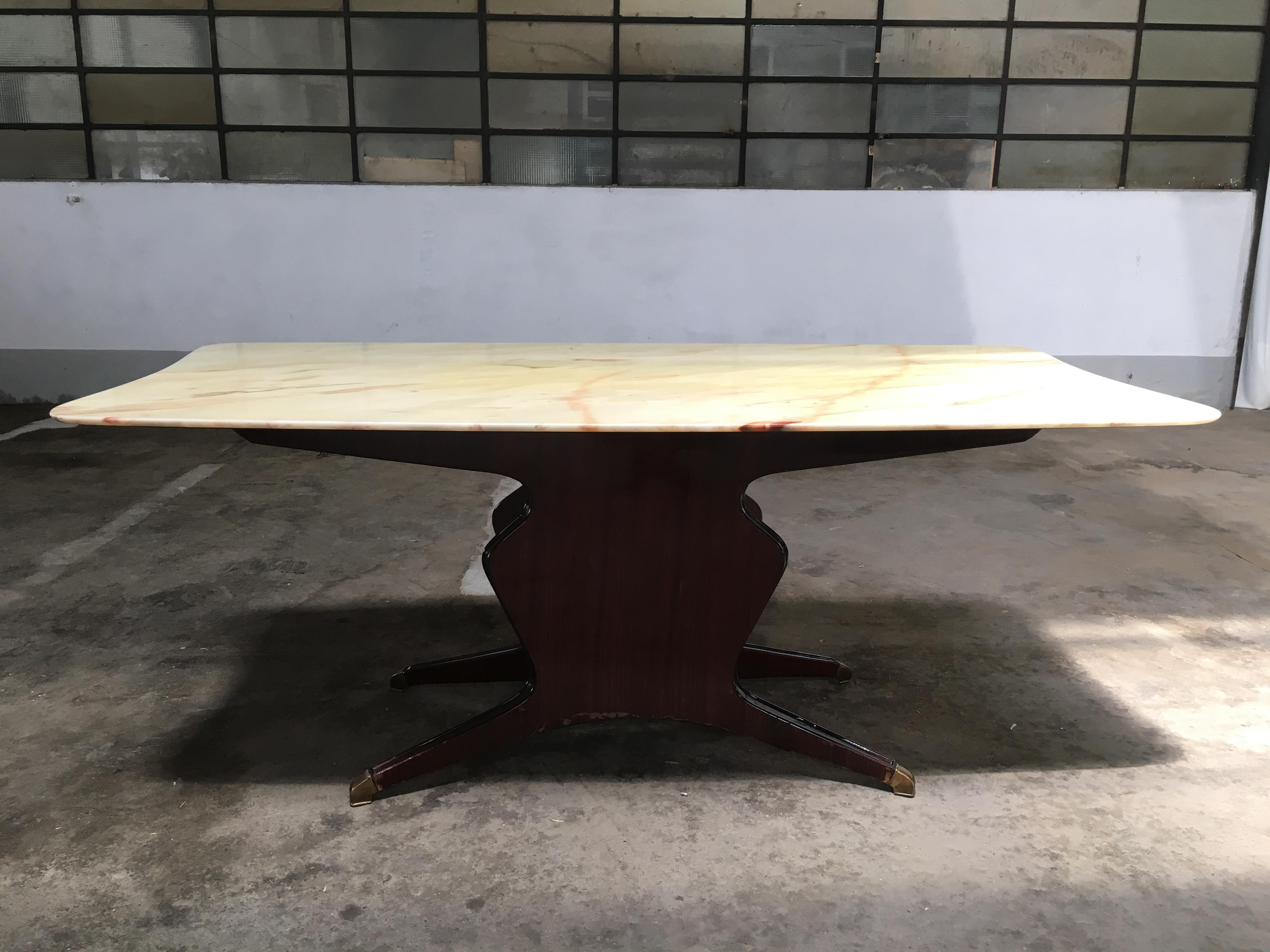 Mid-Century Modern Italian dining or conference mahogany veneer wood and onyx top table with brass feet by Osvaldo Borsani produced by 