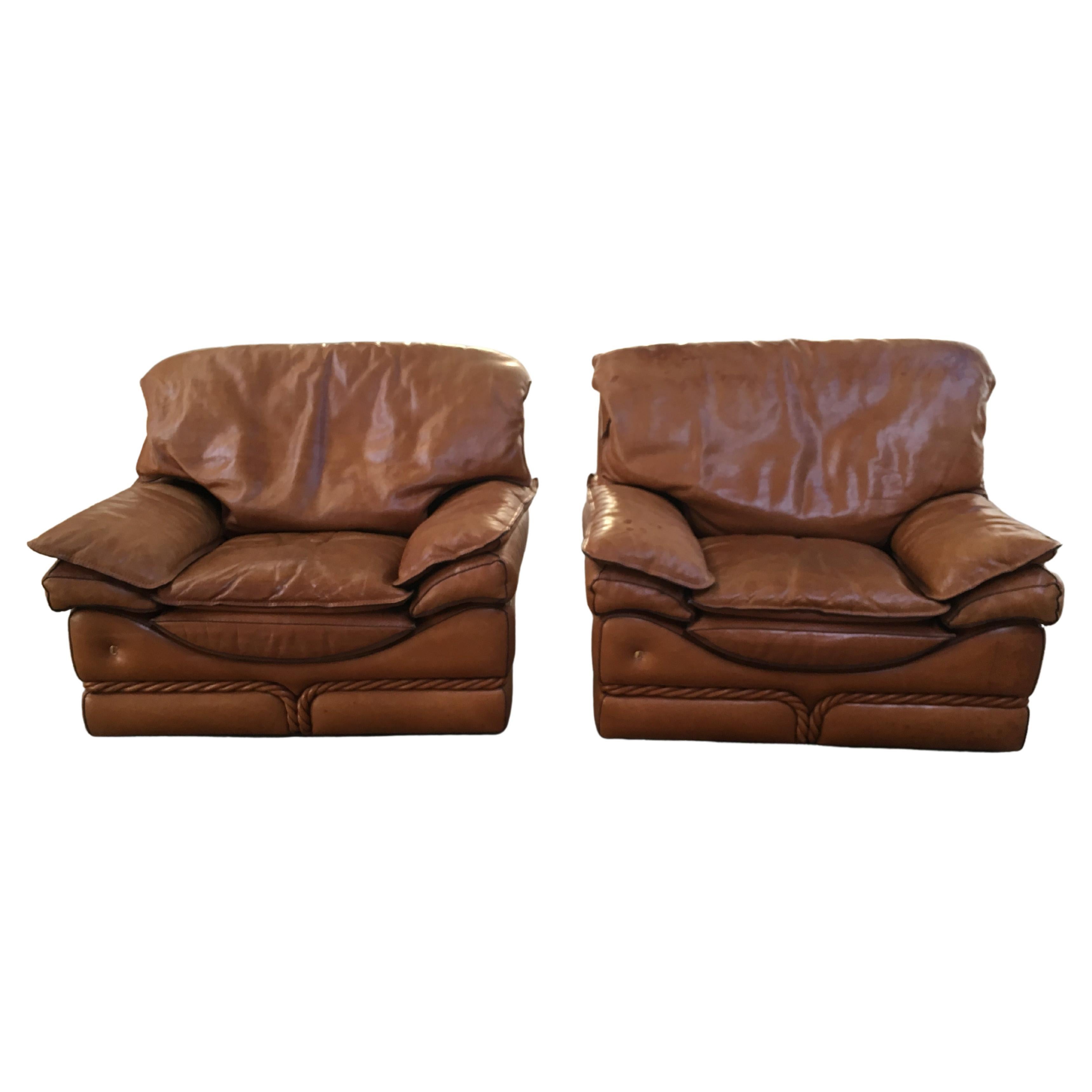 Paire de fauteuils en cuir italiens de style mi-siècle moderne par Mobilificio Colombo en vente