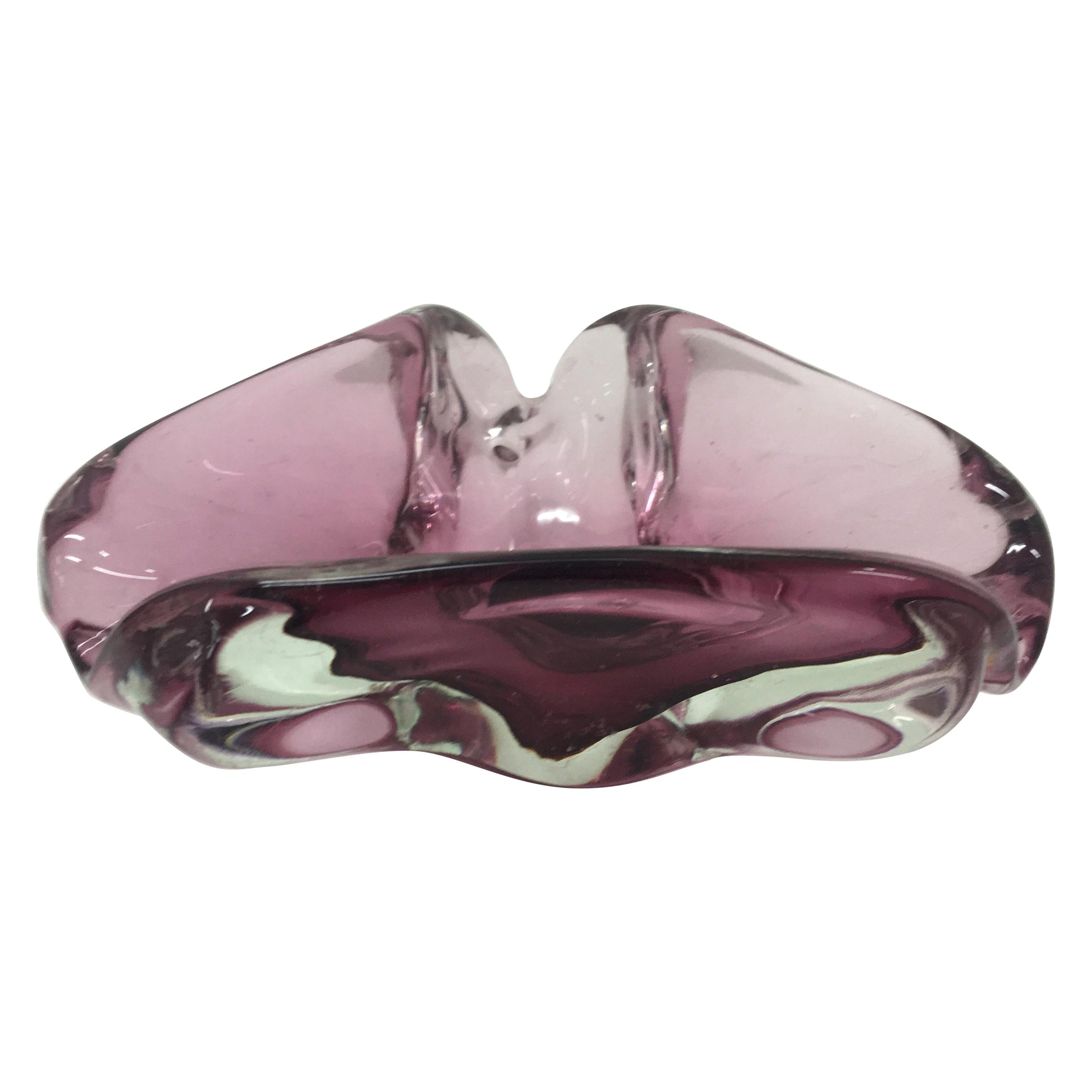 This is a Sommerso Purple and transparent Murano glass ashtray designed and manufactured in Italy in the Seventies by Seguso. The ashtray it's in perfect conditions. The ashtray crafted from Murano glass, a renowned type of glass produced on the