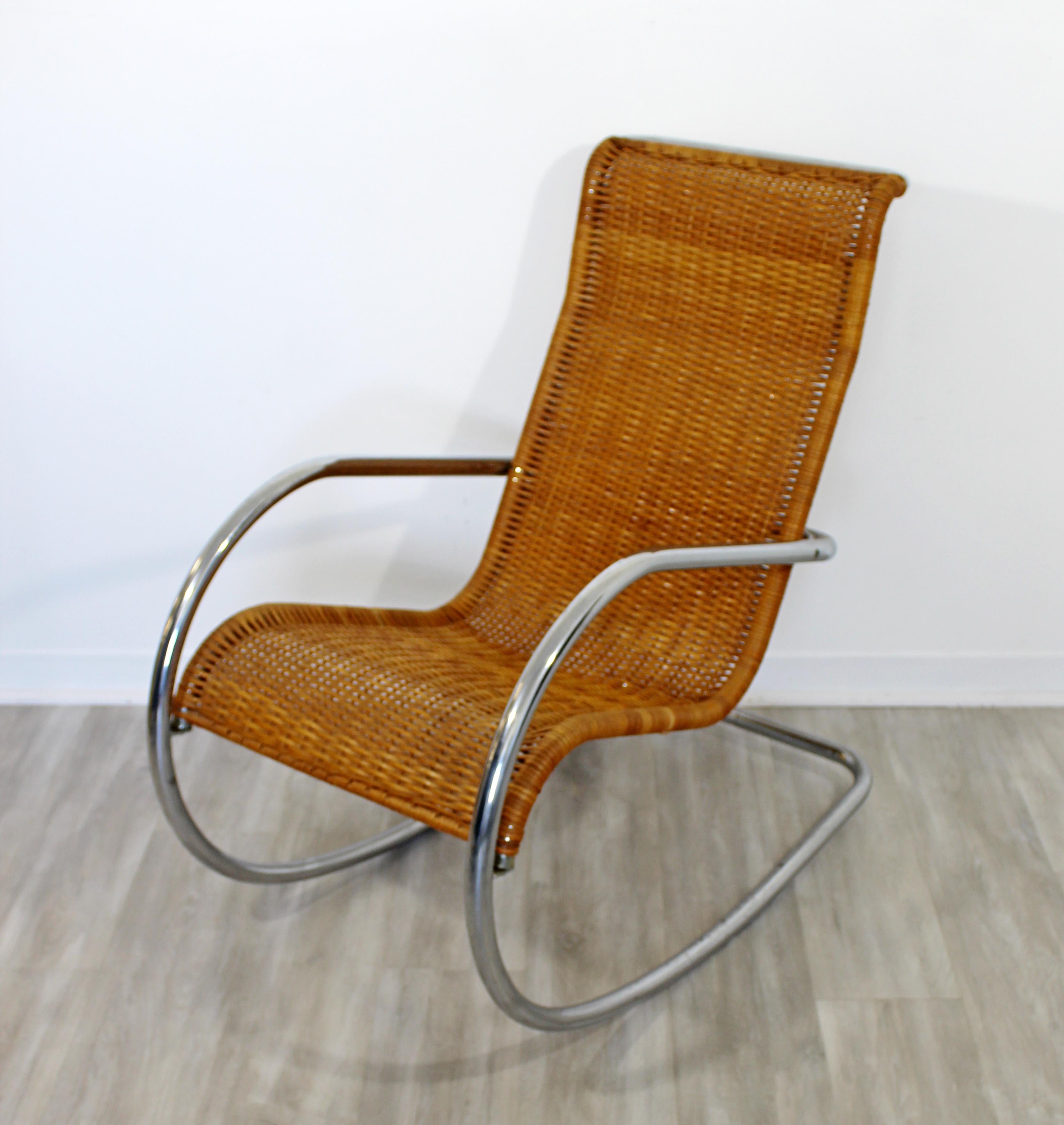 For your consideration is a beautiful rocking chair, made of tubular chrome and rattan in the style of Mies Van Der Rohe, made in Italy, circa 1970s. In very good vintage condition. The dimensions are 21