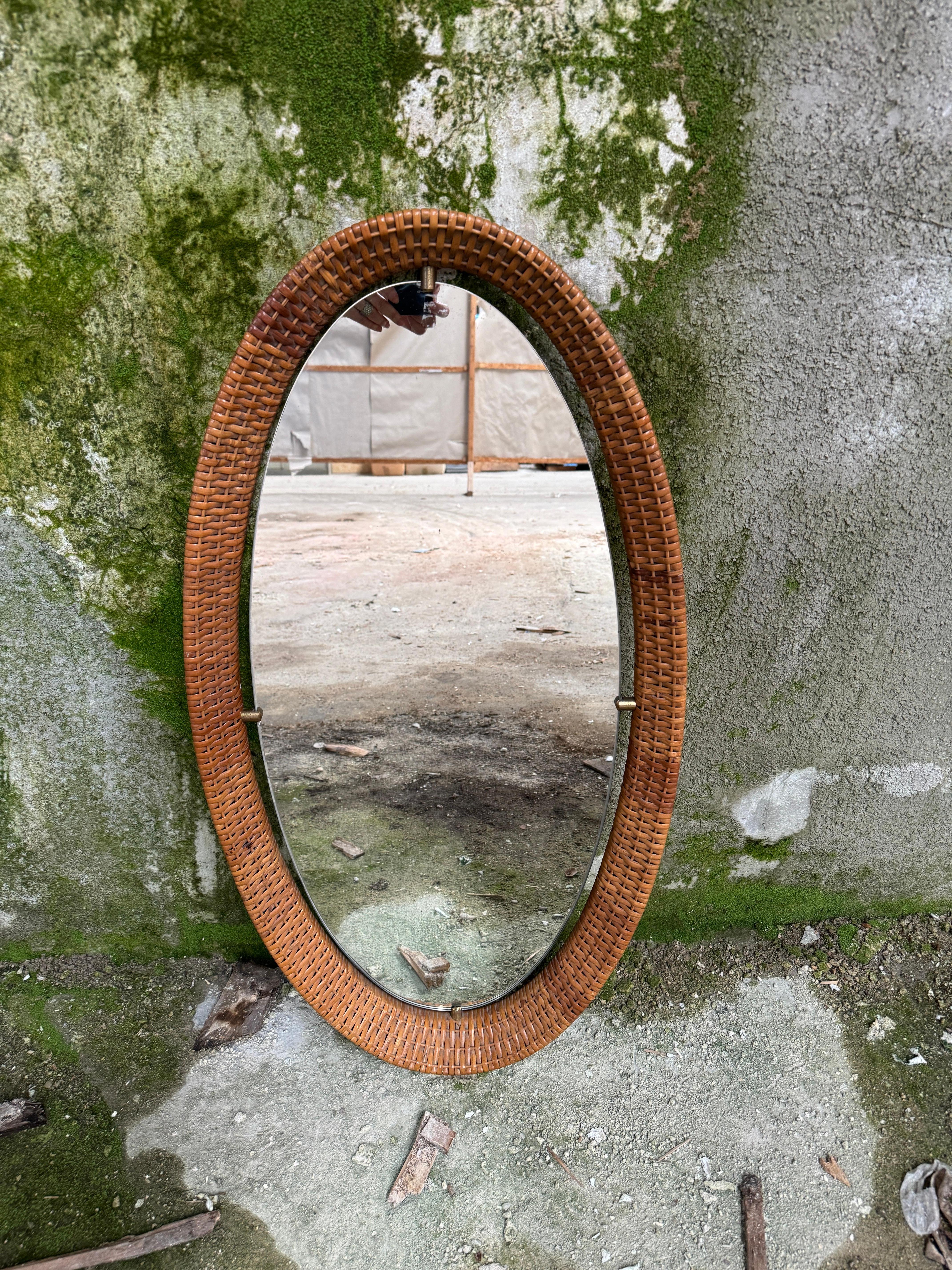 Mid-20th Century Mid-Century Modern Italian Rattan Wall Mirror with Brass Details. 1960s For Sale