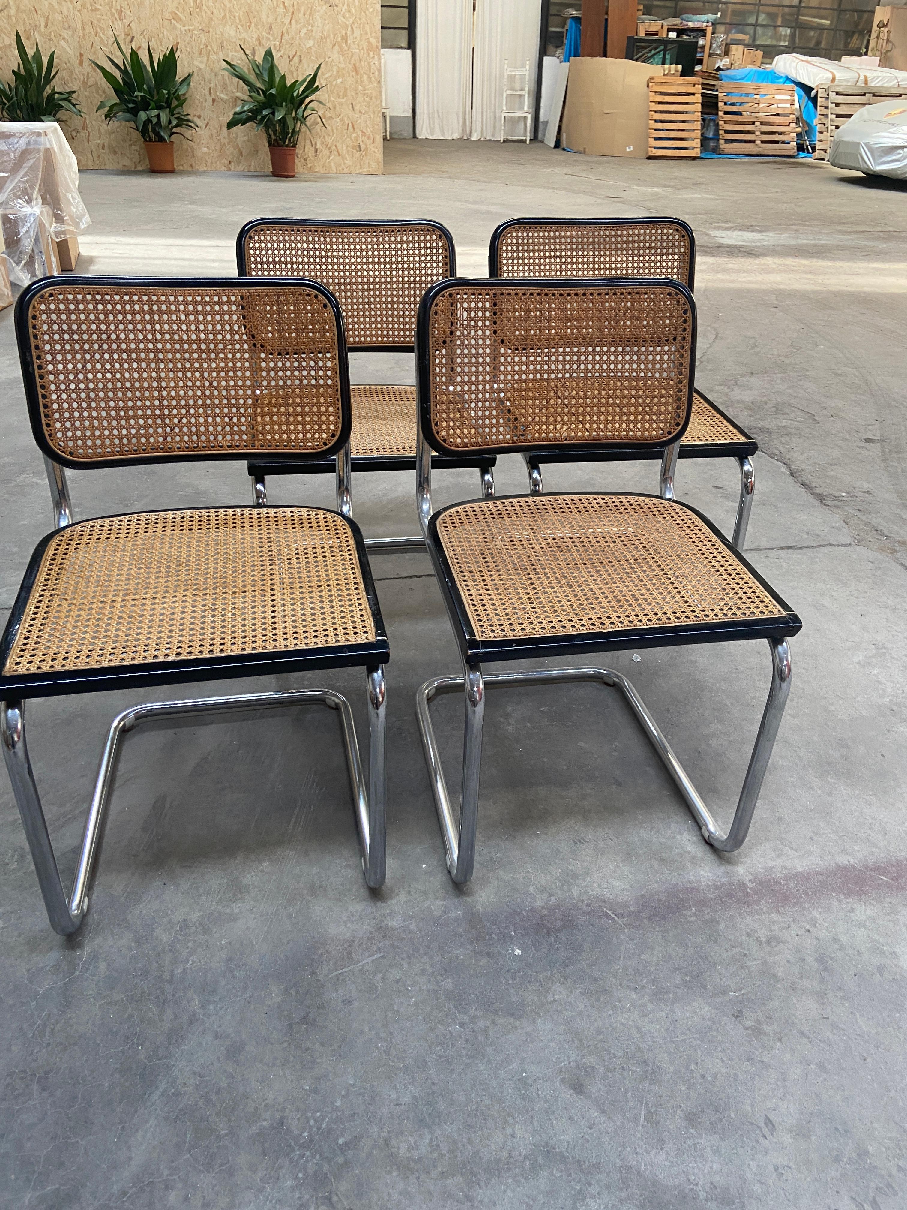 Mid-Century Modern Italian set of 4 Cesca Black Chairs with Vienna Straw and Chrome Cantilever Structure by Marcel Breuer. 1970s