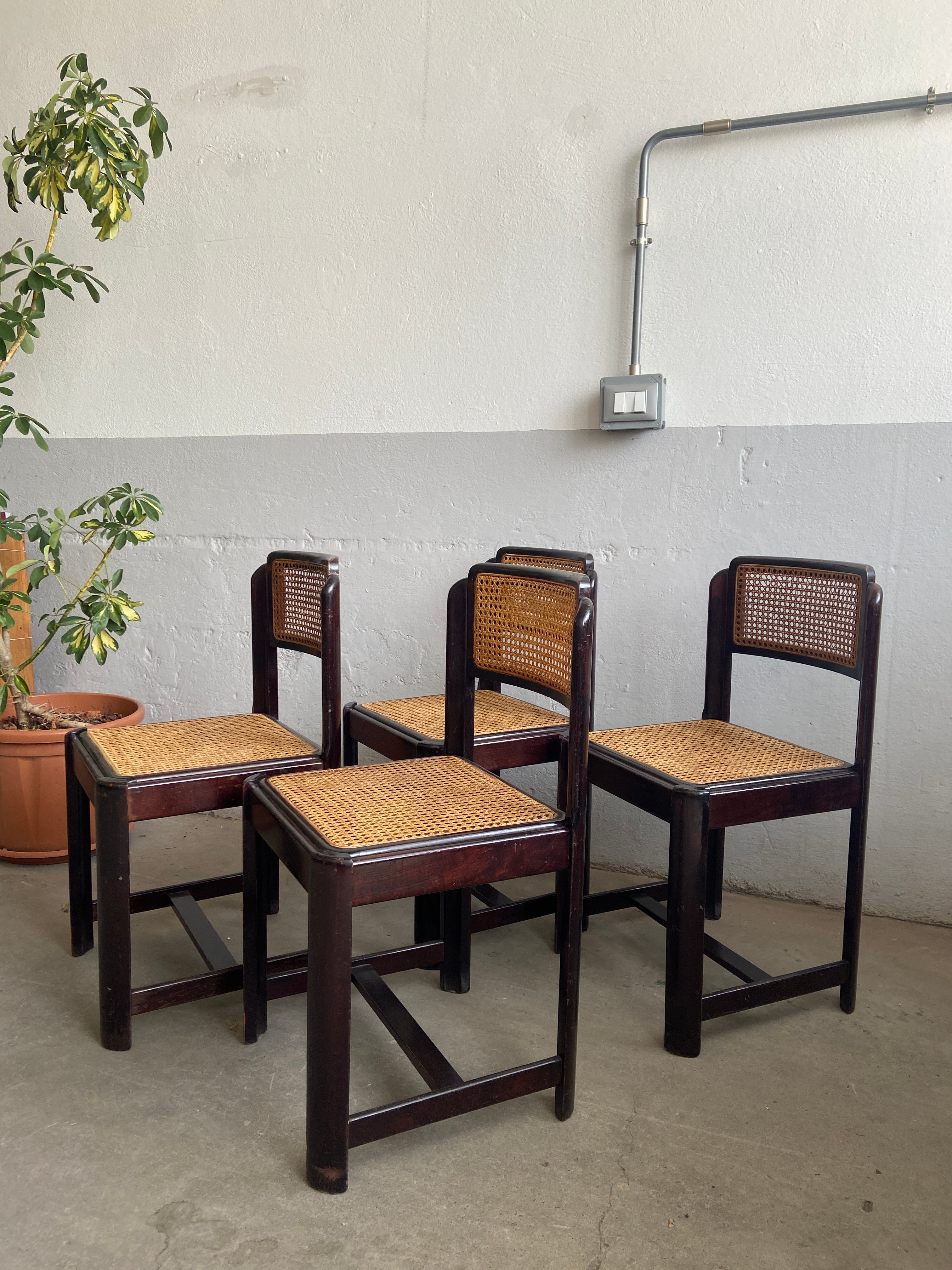 Mid-Century Modern Italian Set of 4 Mahogany dining Chairs with Vienna Straw in the style of Carlo Bartoli.
The chairs are in really good vintage conditions. Wear consistent with age and use.
All the seats have been replaced with with high level