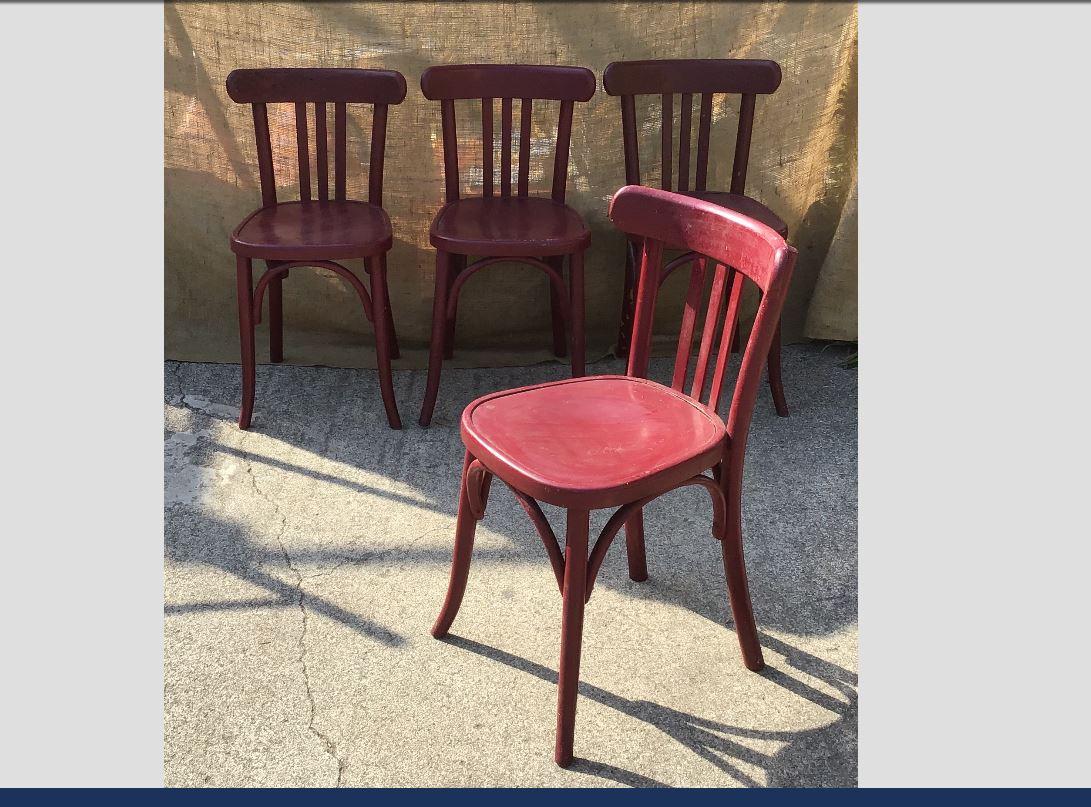 Mid-Century Modern Italian set of 4 red painted wooden chairs, 1950s.
