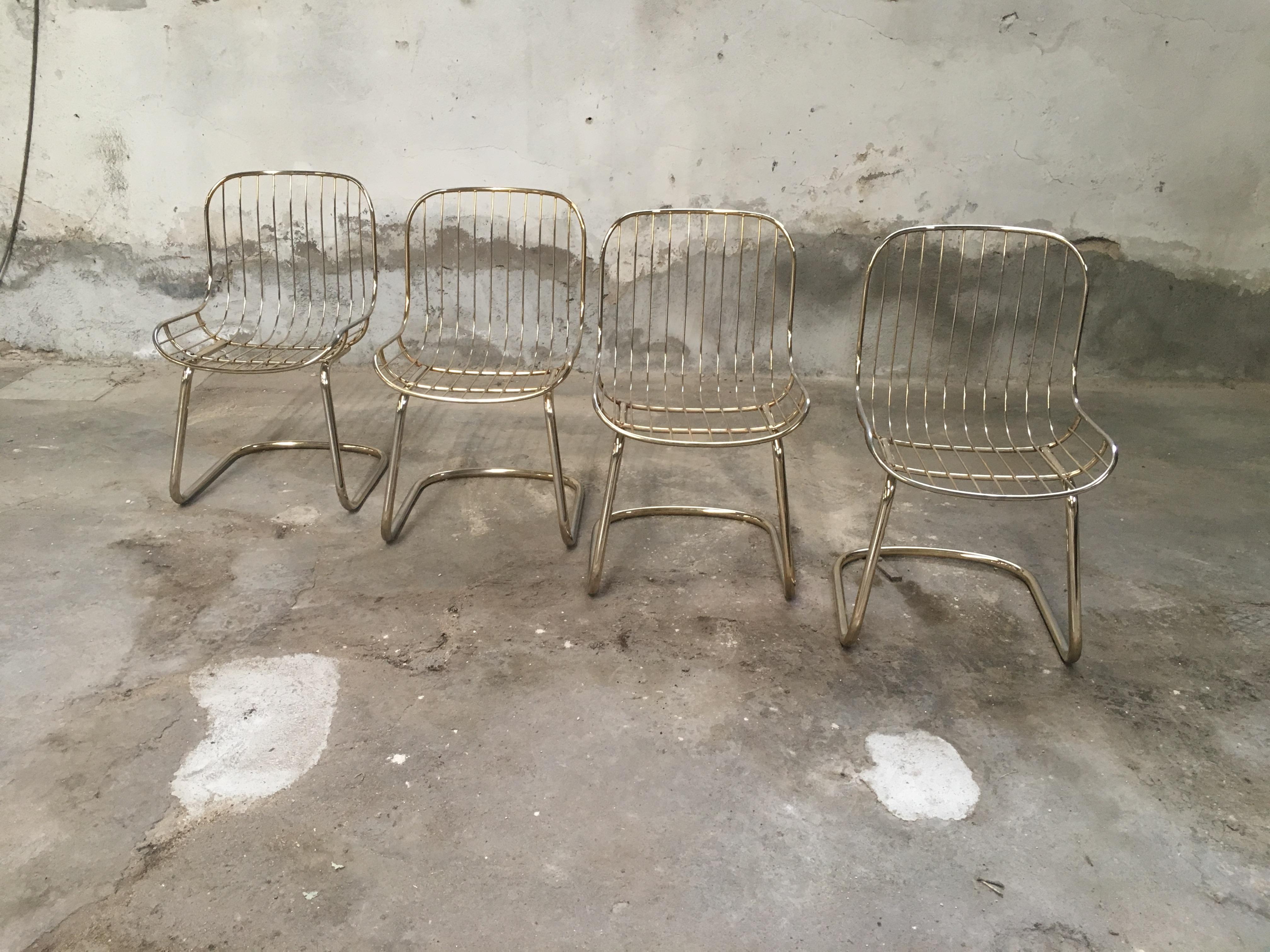 Mid-Century Modern Italian set of four gilt metal dining chairs from 1970s