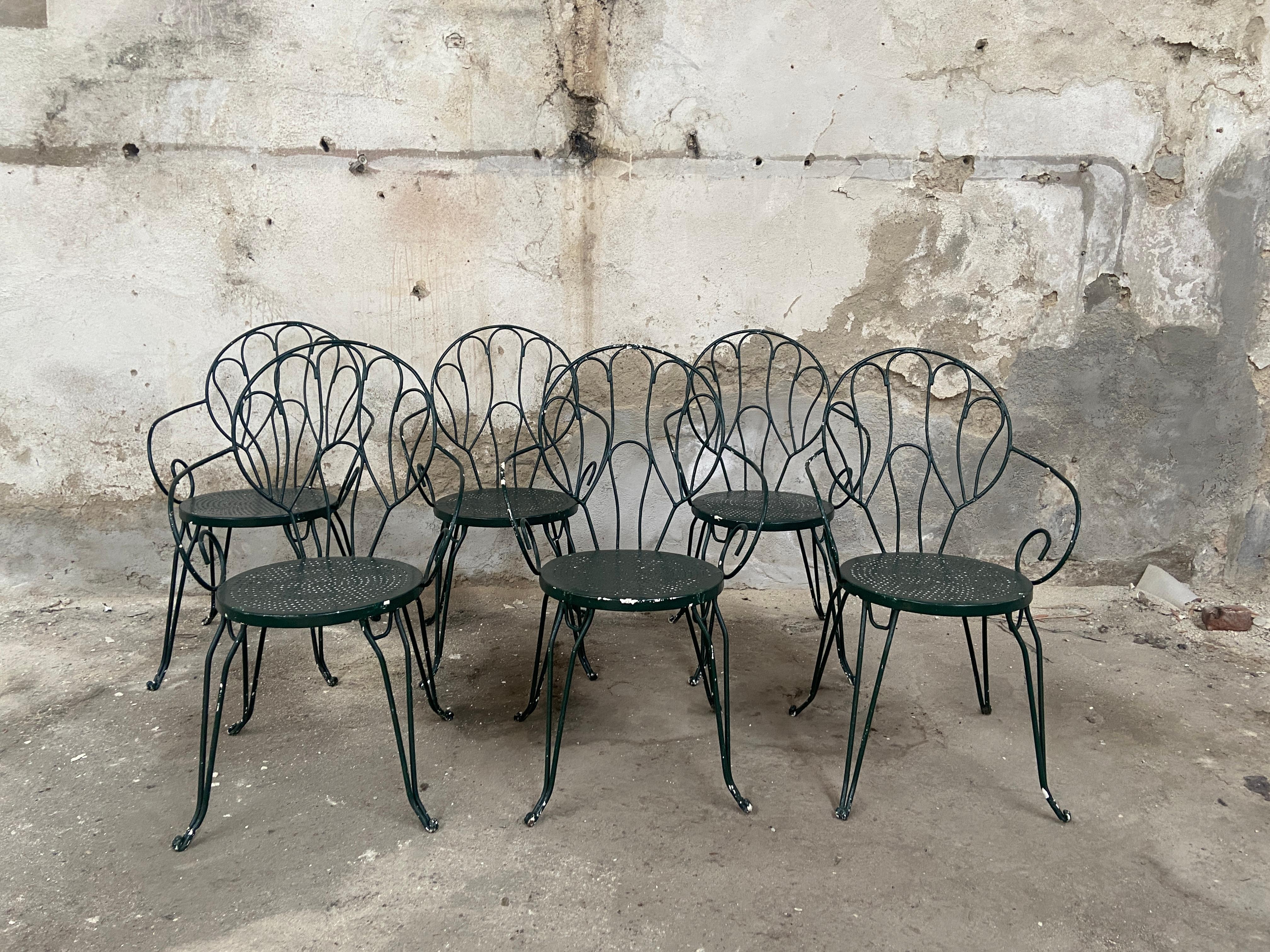 Mid-Century Modern Italian set of 6 iron garden or terrace chairs, green painted from 1960s
The chairs are in absolutely good vintage condition with very solid structure. The color needs to be repainted in some places. Quote for lacquering the
