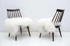 Poltrone curvilinee in pelle di pecora di Pizzetti Roma, coppia di metà secolo.