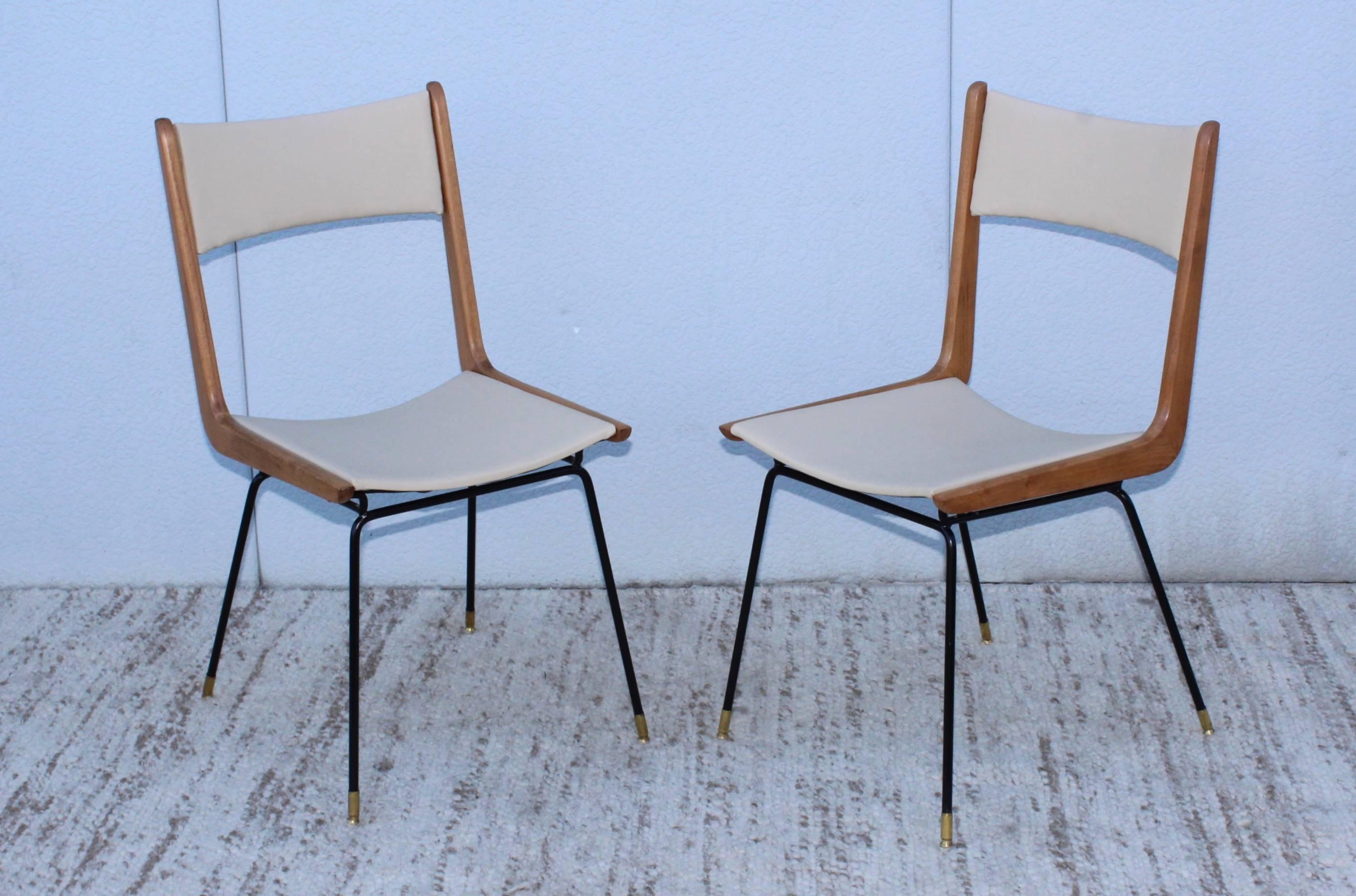 1950s Italian modern side chairs in the style of Carlo di Carli.