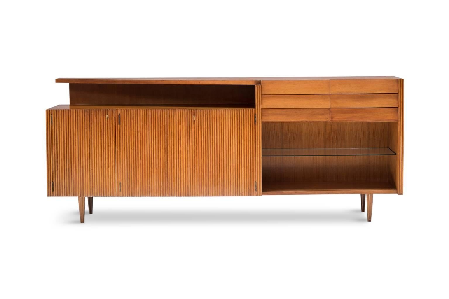 Extraordinary Italian sideboard in pearwood, 1950s

Beautiful wood ornaments and glass shelving. 


Measures: W 221 cm x 46 cm x 90 cm.


    