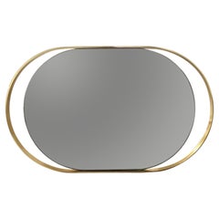 Miroir mural ovale italien en verre fumé, moderne du milieu du siècle dernier, avec cadre en métal doré