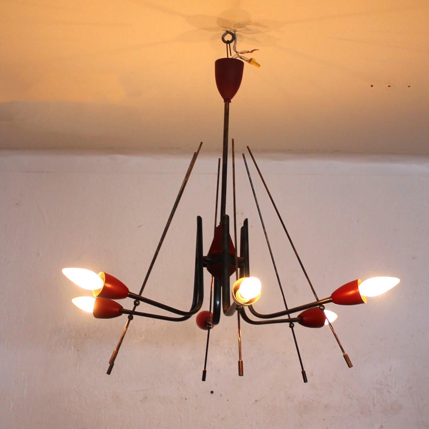 For your consideration a vintage modern Italian chandelier.
Constructed with solid brass and aluminum shades painted in red color.

Rewired and ready to go. It will require six (6) e-14 bulbs. Bulbs not included.
The E-14 comes in different shapes