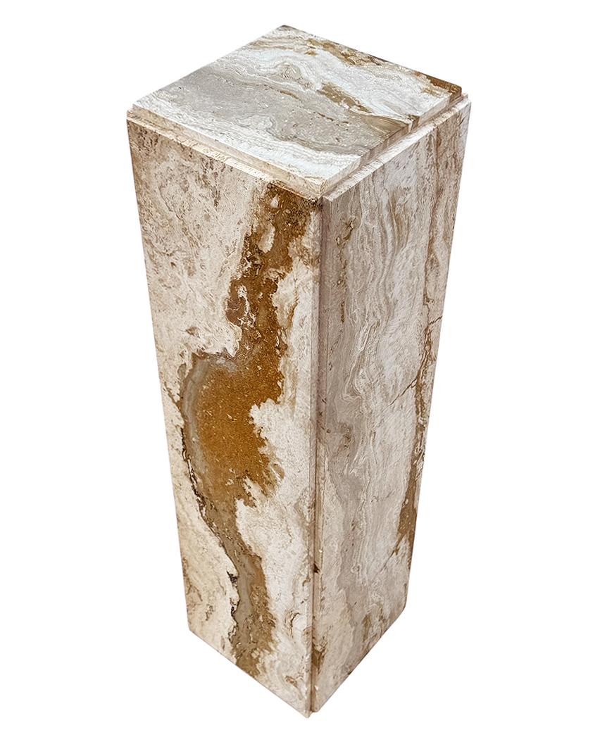 A versatile modern pedestal from Italy circa 1970s. It features 100% travertine construction. Excellent overall condition with beautiful veining.