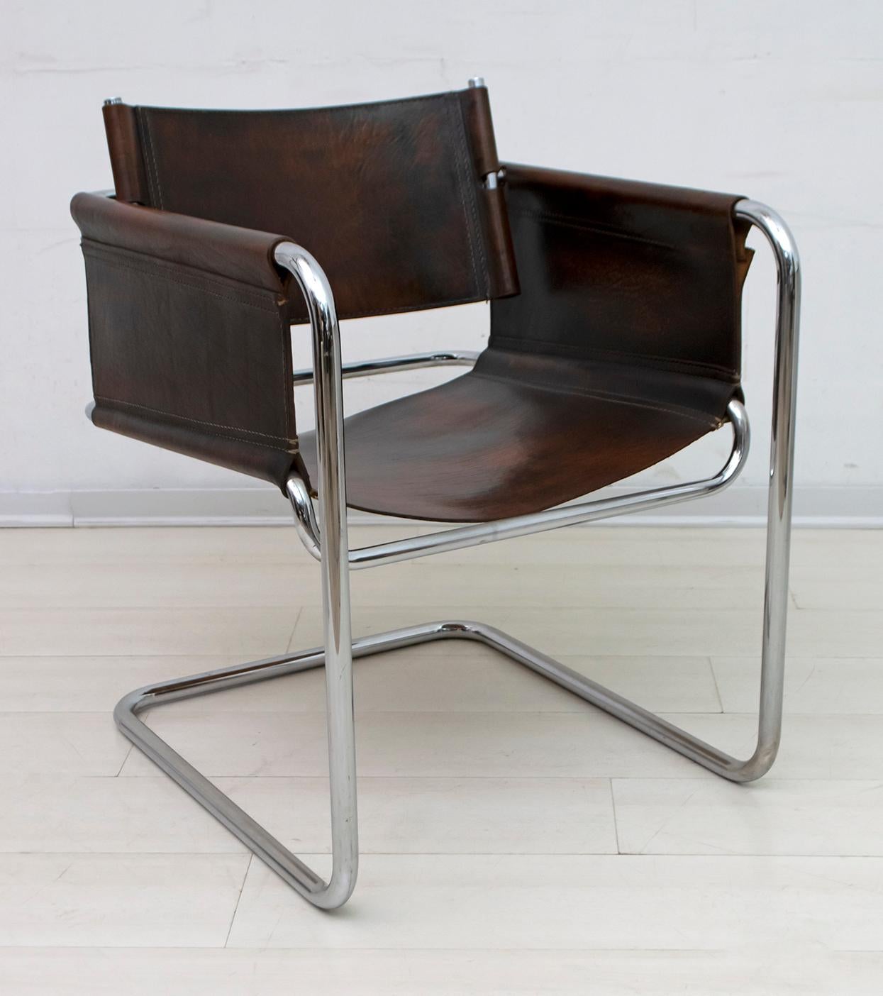 Bauhaus style armchair, circa 1960s. Structure in chromed tubular, folding seat and back in thick leather.