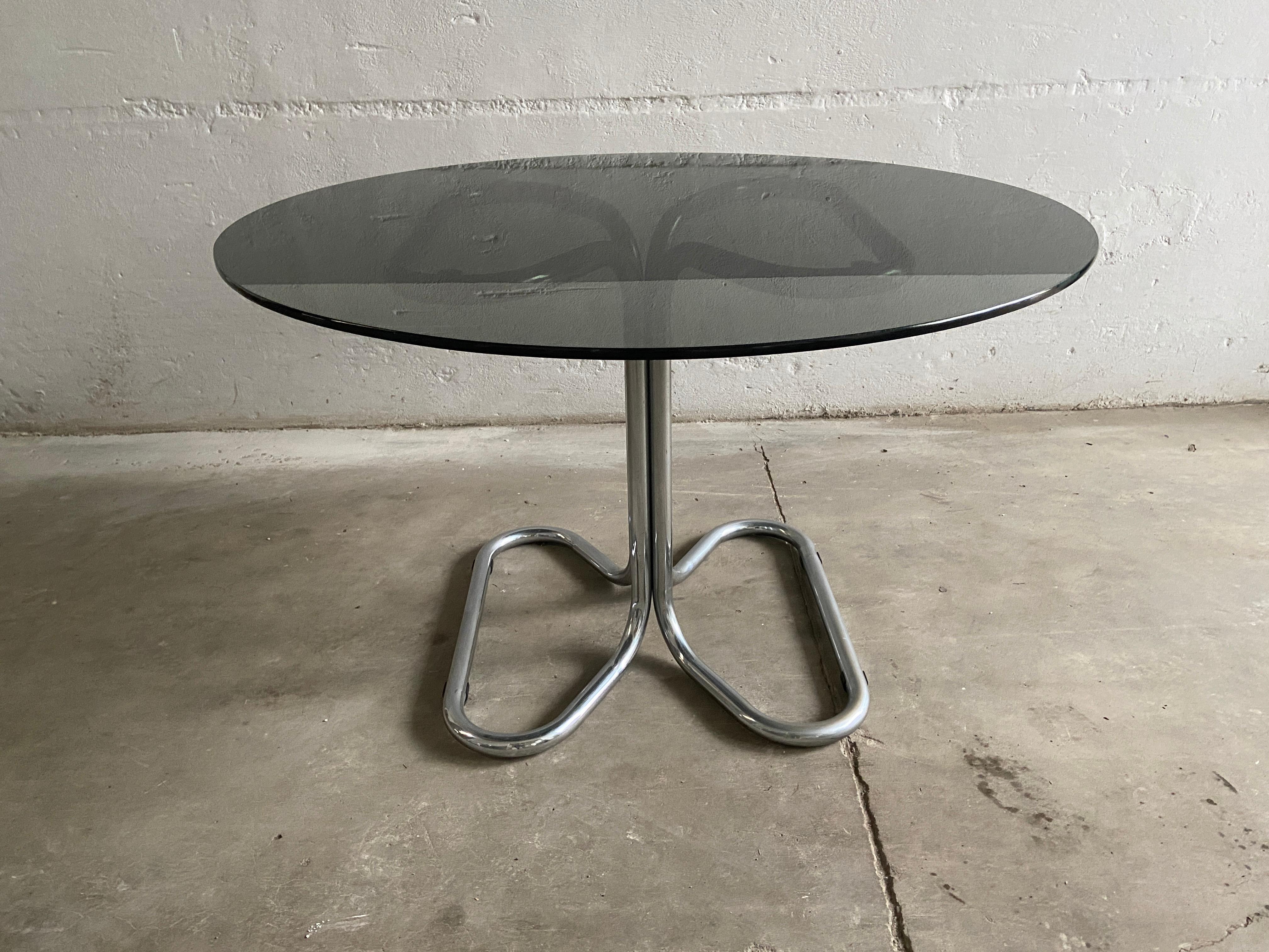 Mid-Century Modern Italian Giotto Stoppino dining or center table with chrome base and smoked glass top, 1970s.