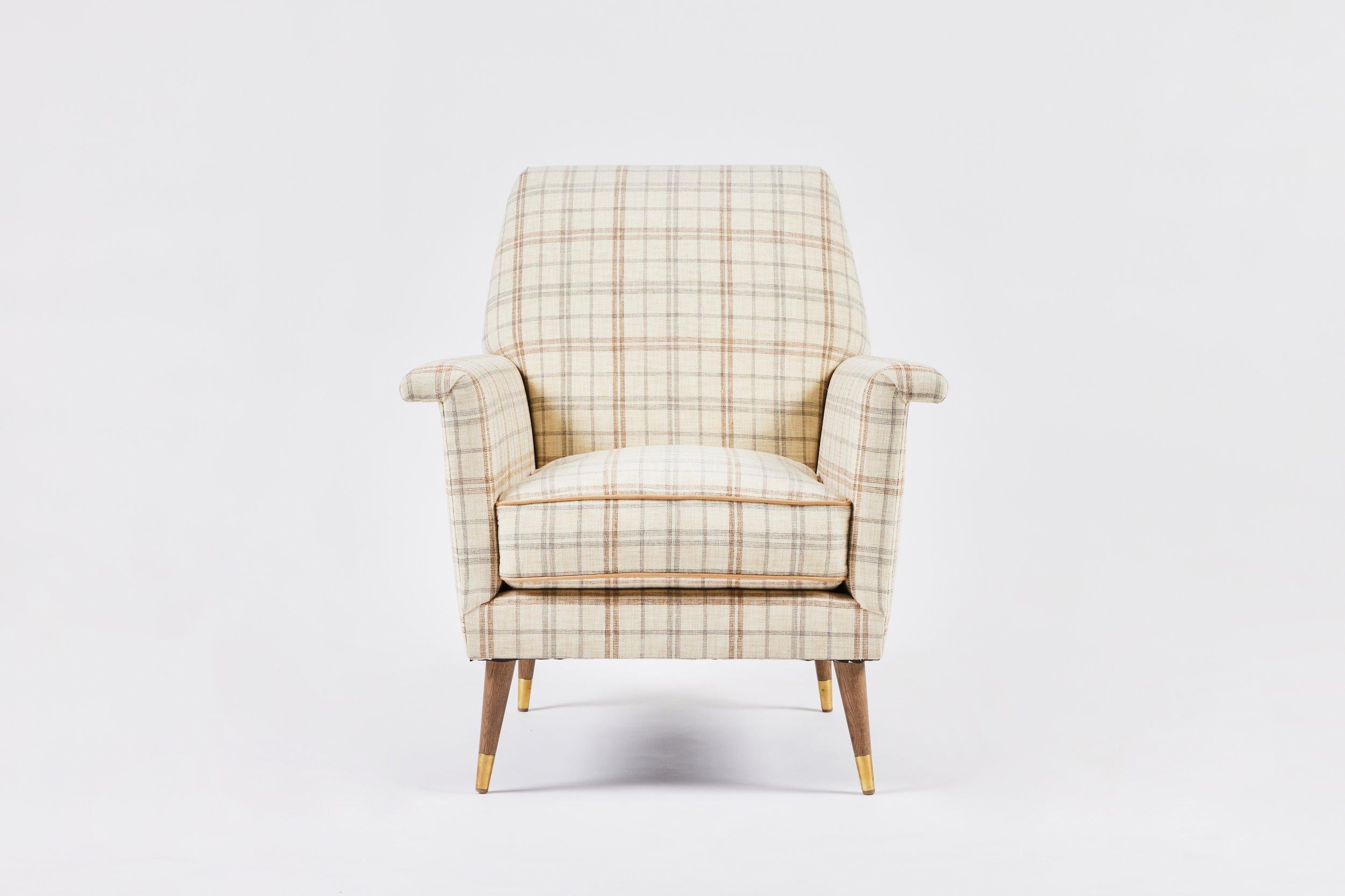 Martin & Brockett’s Jolly Club Chair is inspired in equal part by Italian modernism, streamlined comfort and the charming open air beach car it is named after. Its elegantly folded edges meet a tight upholstered frame, loose seat cushion, and