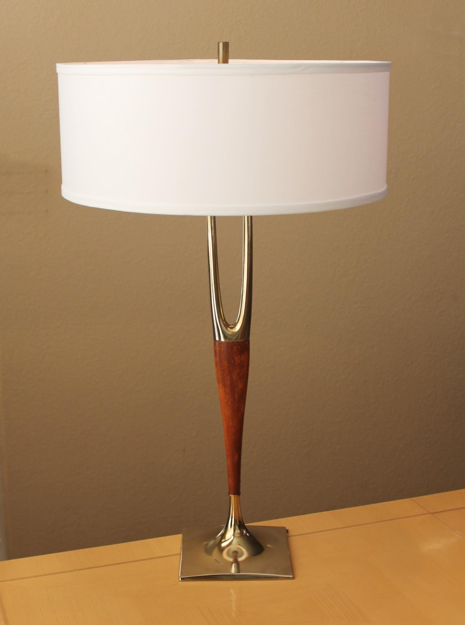 MAGNIFICENT Mid Century Table Lamp 
Maurizio Tempestini for Laurel Lamp Company!

Incredible Brushed Brass!
Hand Cut and Formed Teak!
Iconic 