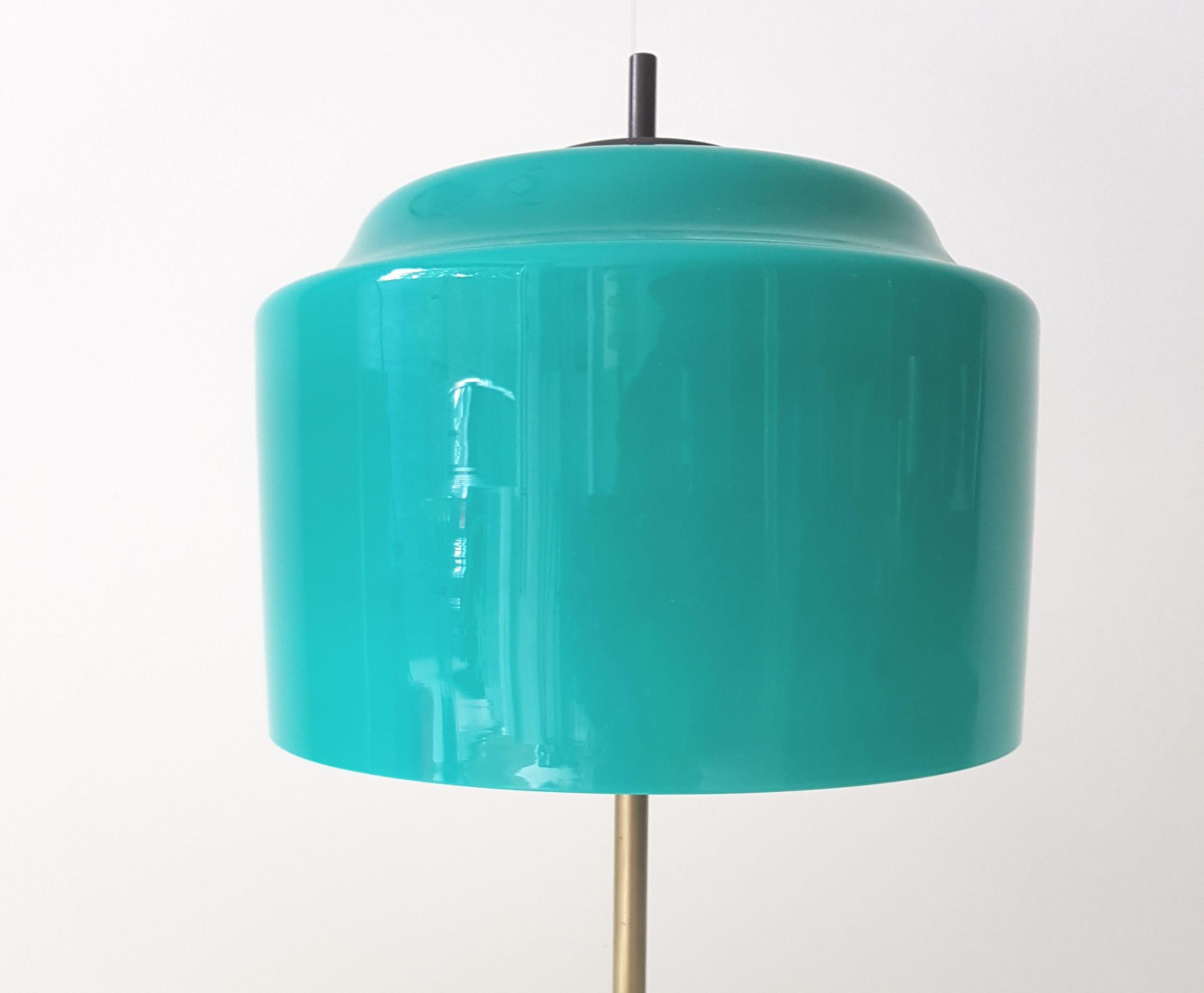 Table or desk lamp with turquoise glass shade and nickeled brass stem by Lumi.