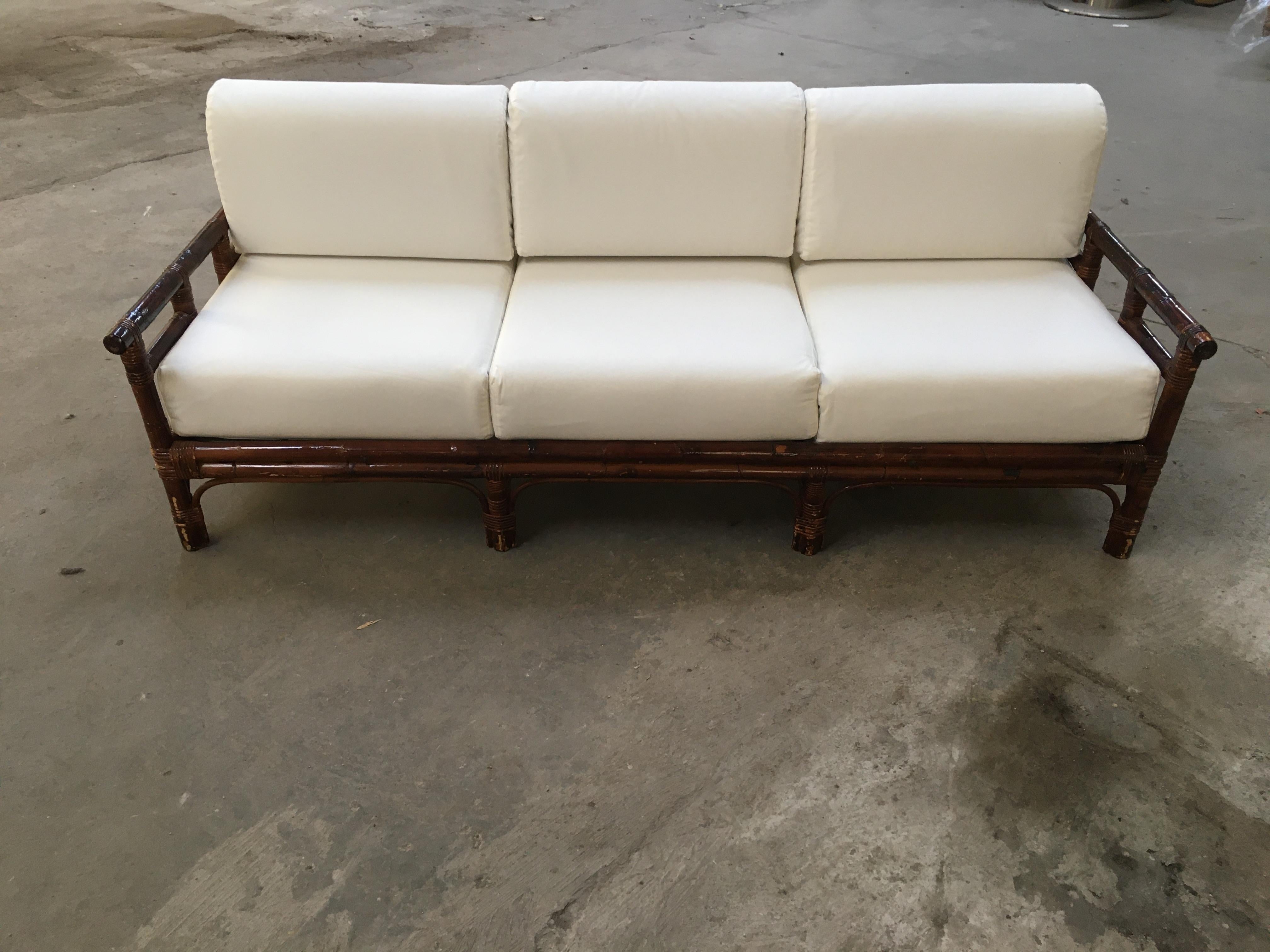 Mid-Century Modern Italian three-seat bamboo sofa with reupholstered cushions, 1970s
The cushions have been covered with white cotton to give the chance to recover them with the right selected fabric.