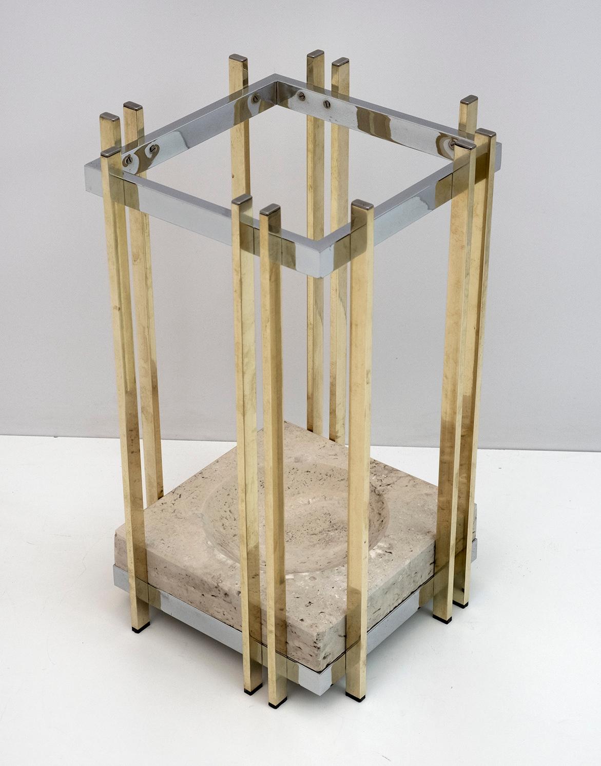 Incredible umbrella stands from the 70s, in brass, chrome and travertine drip tray. This fantastic piece was designed in Italy, in the style of Romeo Rega.