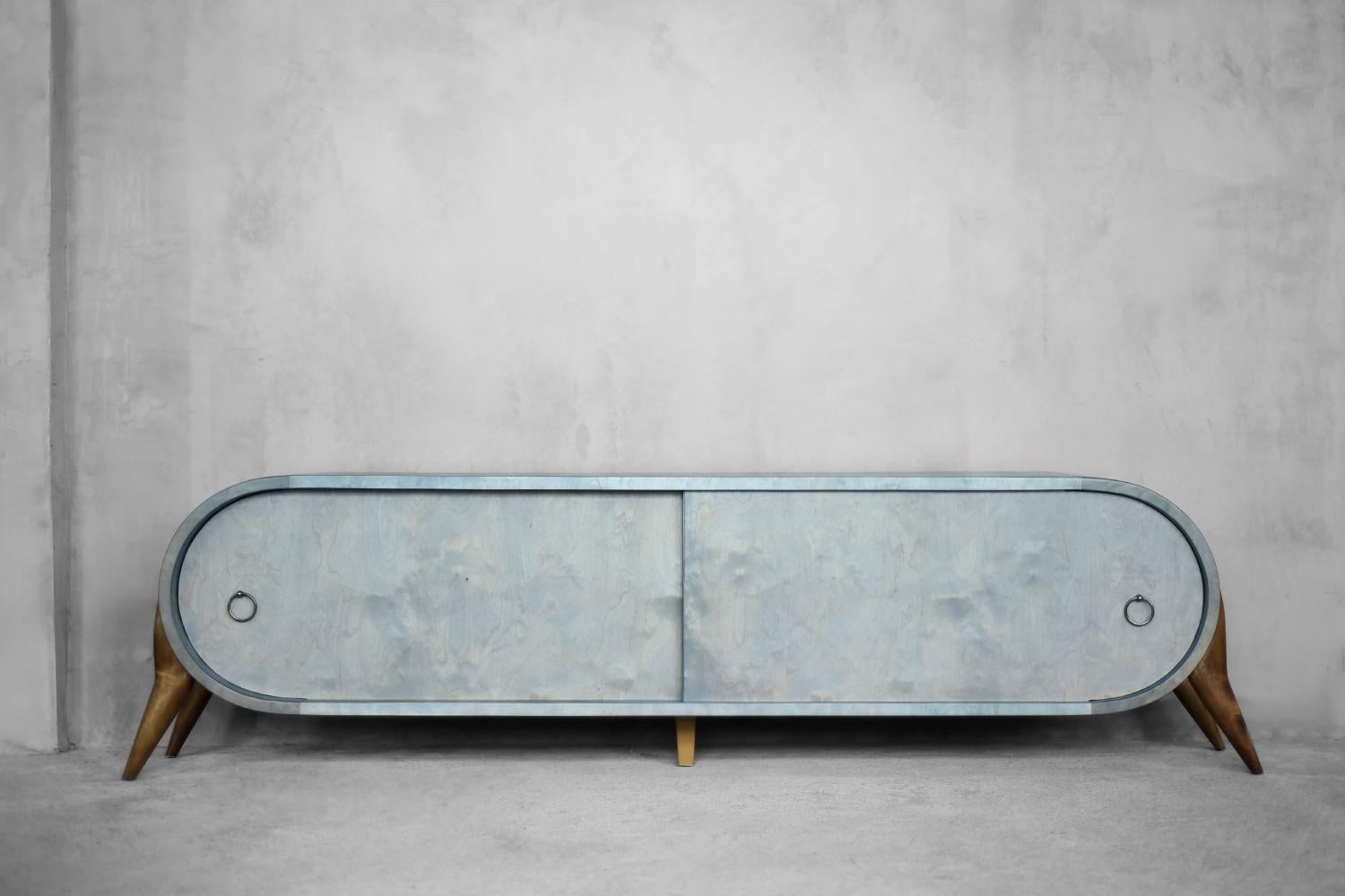 This is the extremely rare, modernist sideboard. Probably produced in only one copy. It strongly refers to Italian works from the 60s. It was made of high-quality birch wood, stained in shades of turquoise and blue. The pattern is surprising because