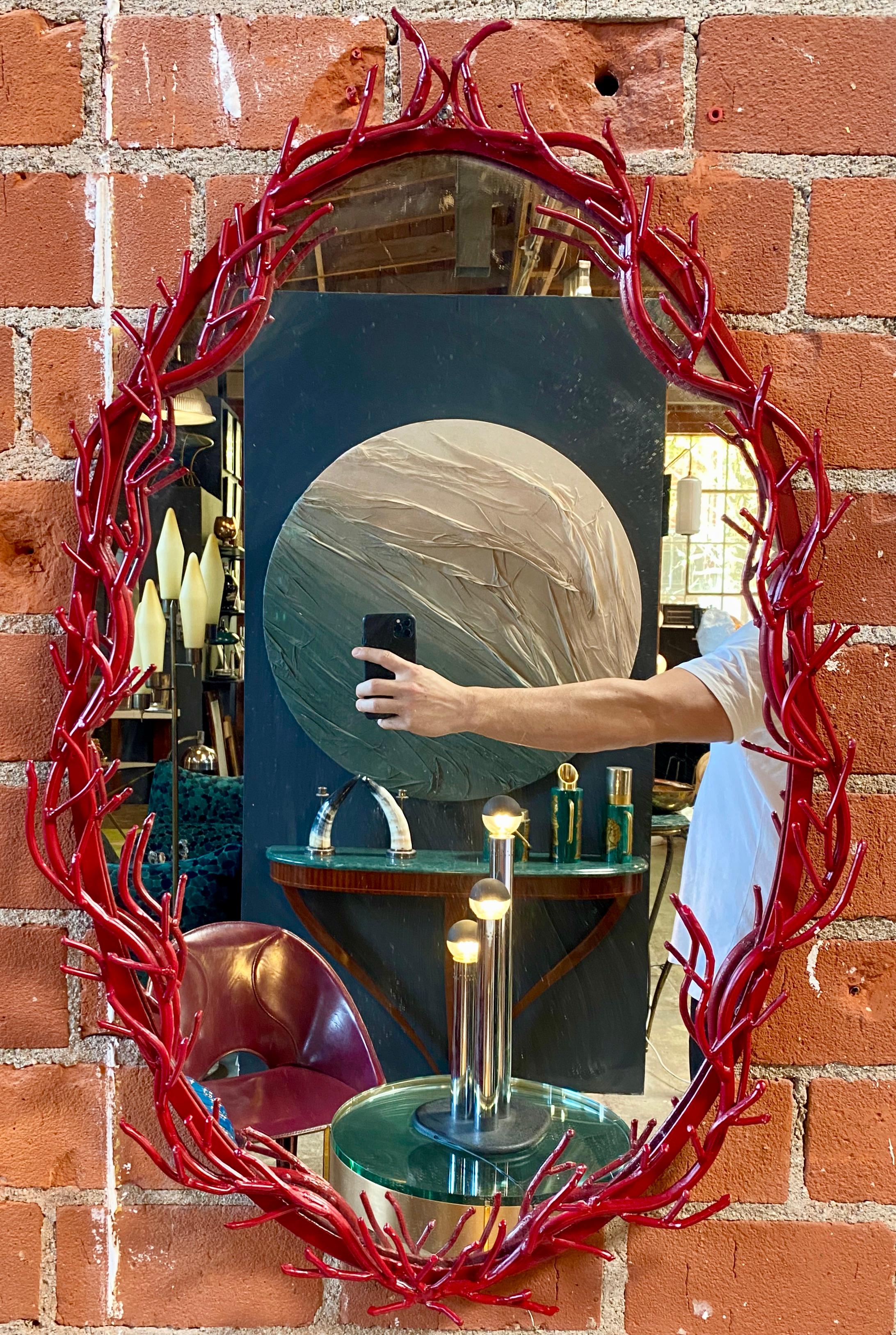 Beautiful Italian mirror with original patina and unique lacquered red frame.