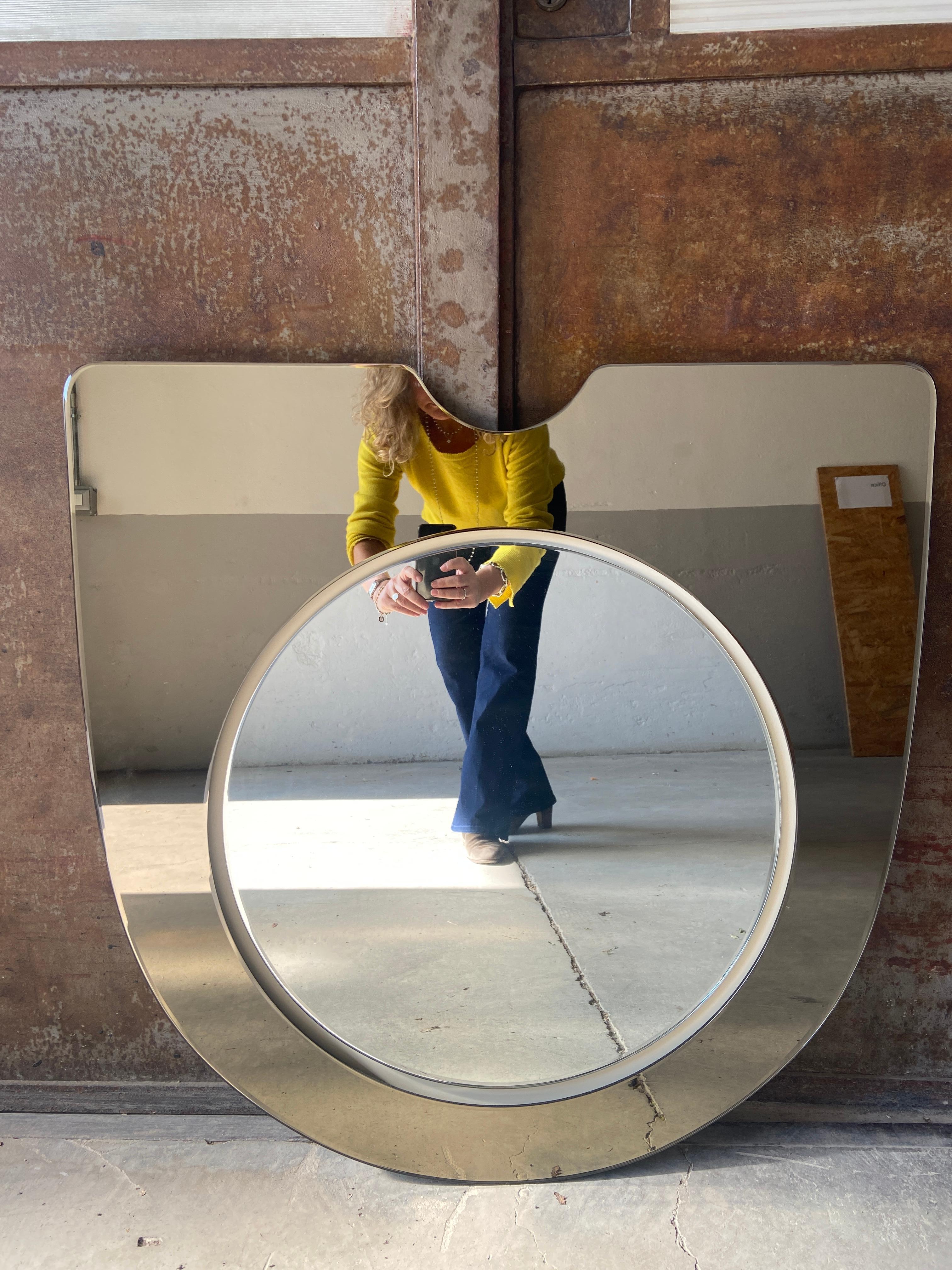 Mid-Century Modern Italian wall mirror with smoked mirror glass and wooden support, 1970s.