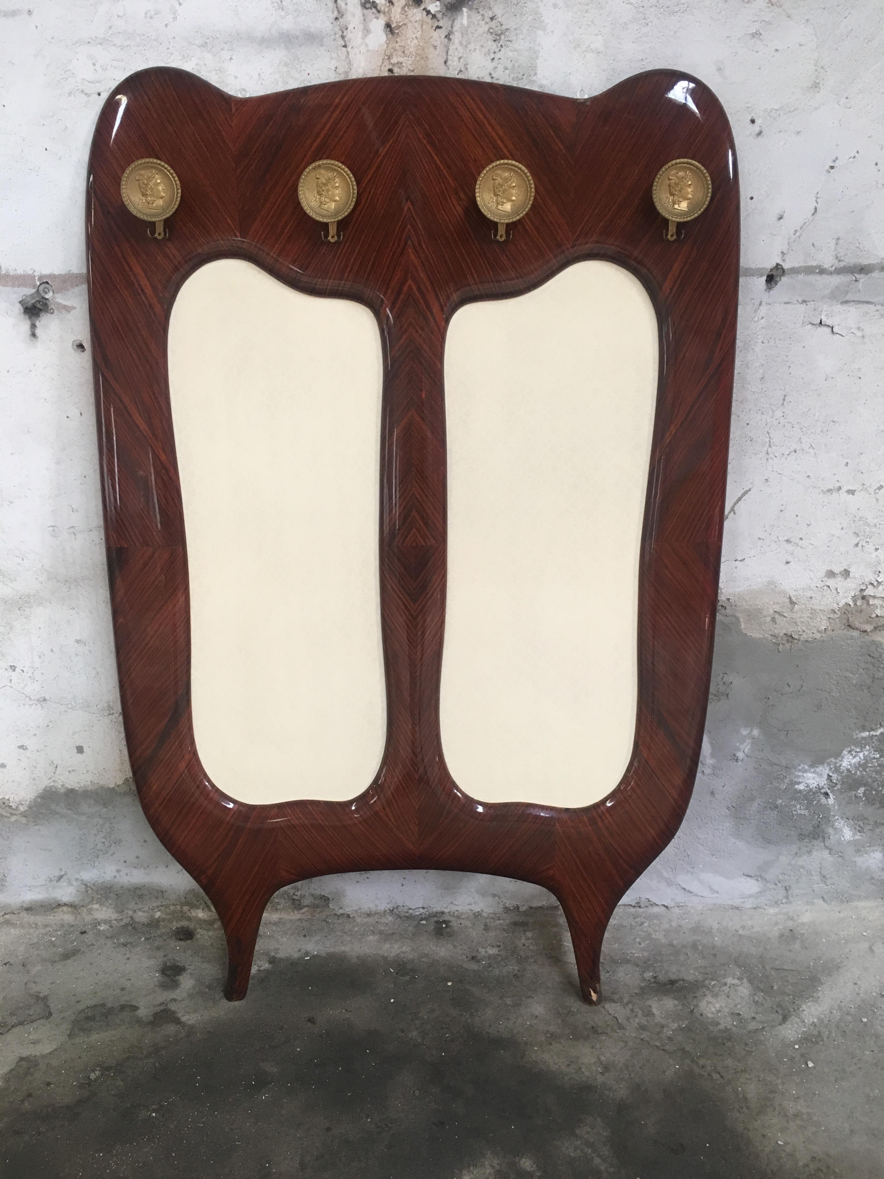 Mid-Century Modern Italian wall-mounted mahogany coat rack with brass neoclassical hooks.