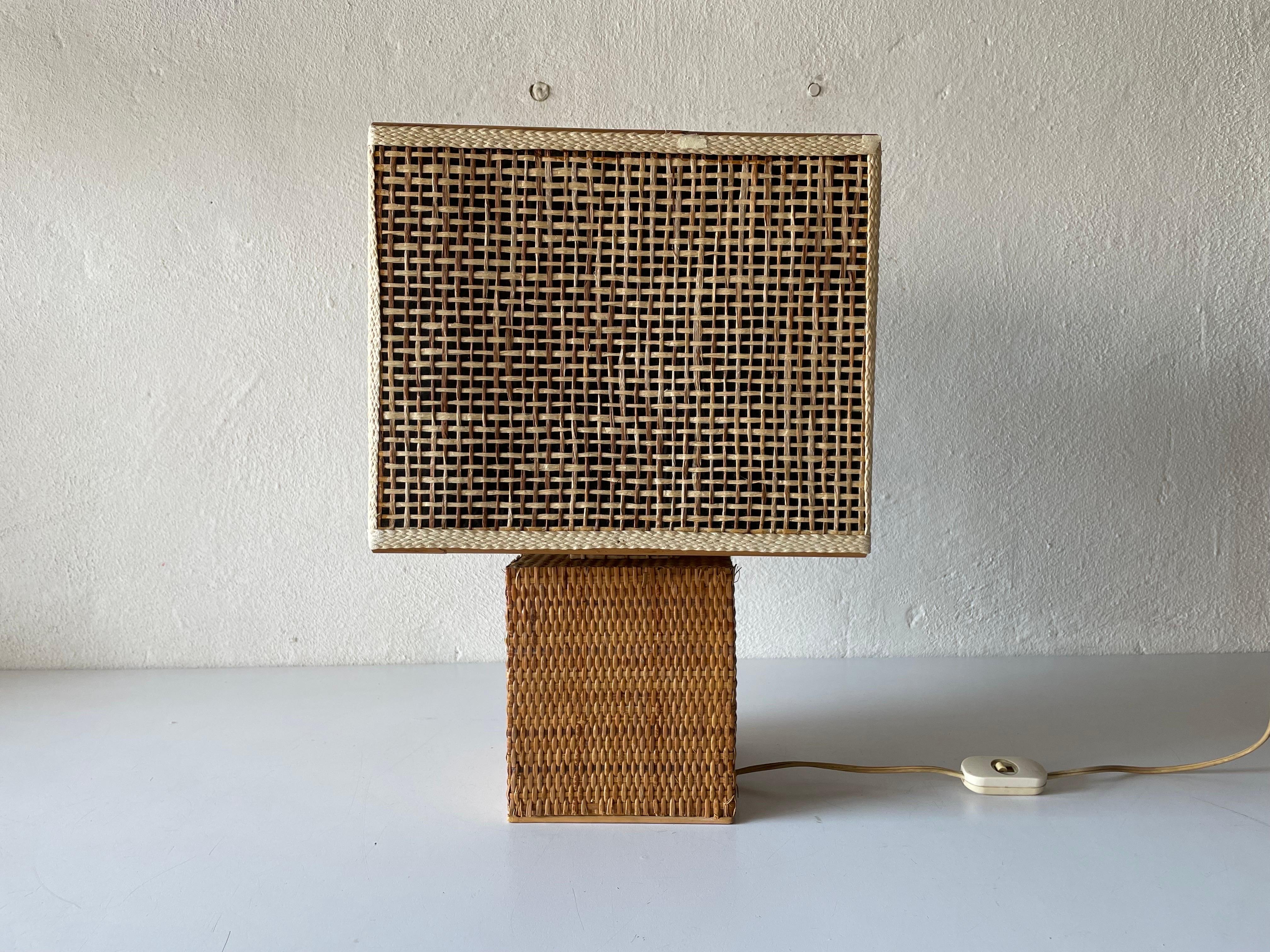 Mid-Century Modern Italian wicker table lamp, 1960s, Italy

Lampshade is in very good vintage condition.

It has European plug. It can be converted to other countries plugs with using converter. Also it can be rewired different type of plugs