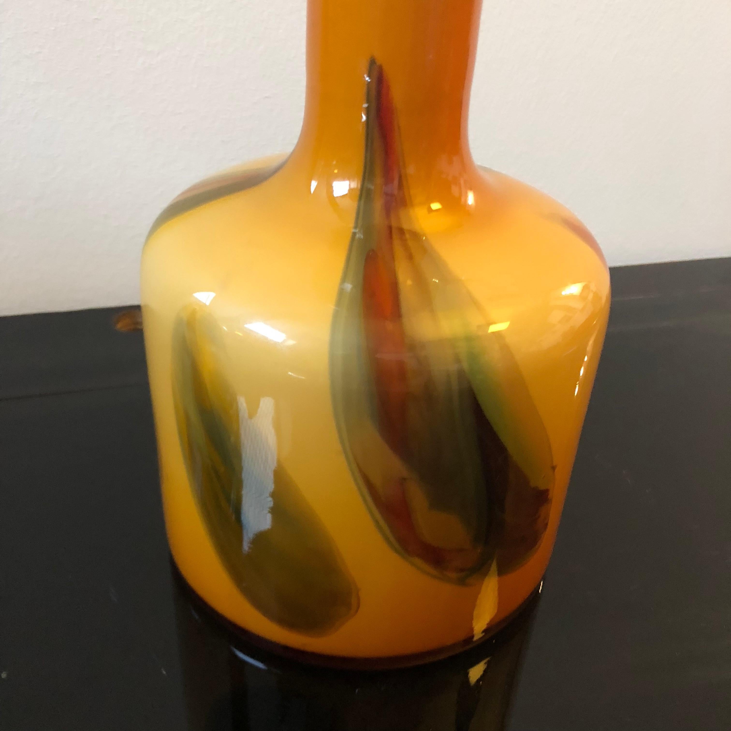 Yellow, red and green opaline vase made in Italy in the 1970s. It's in perfect conditions