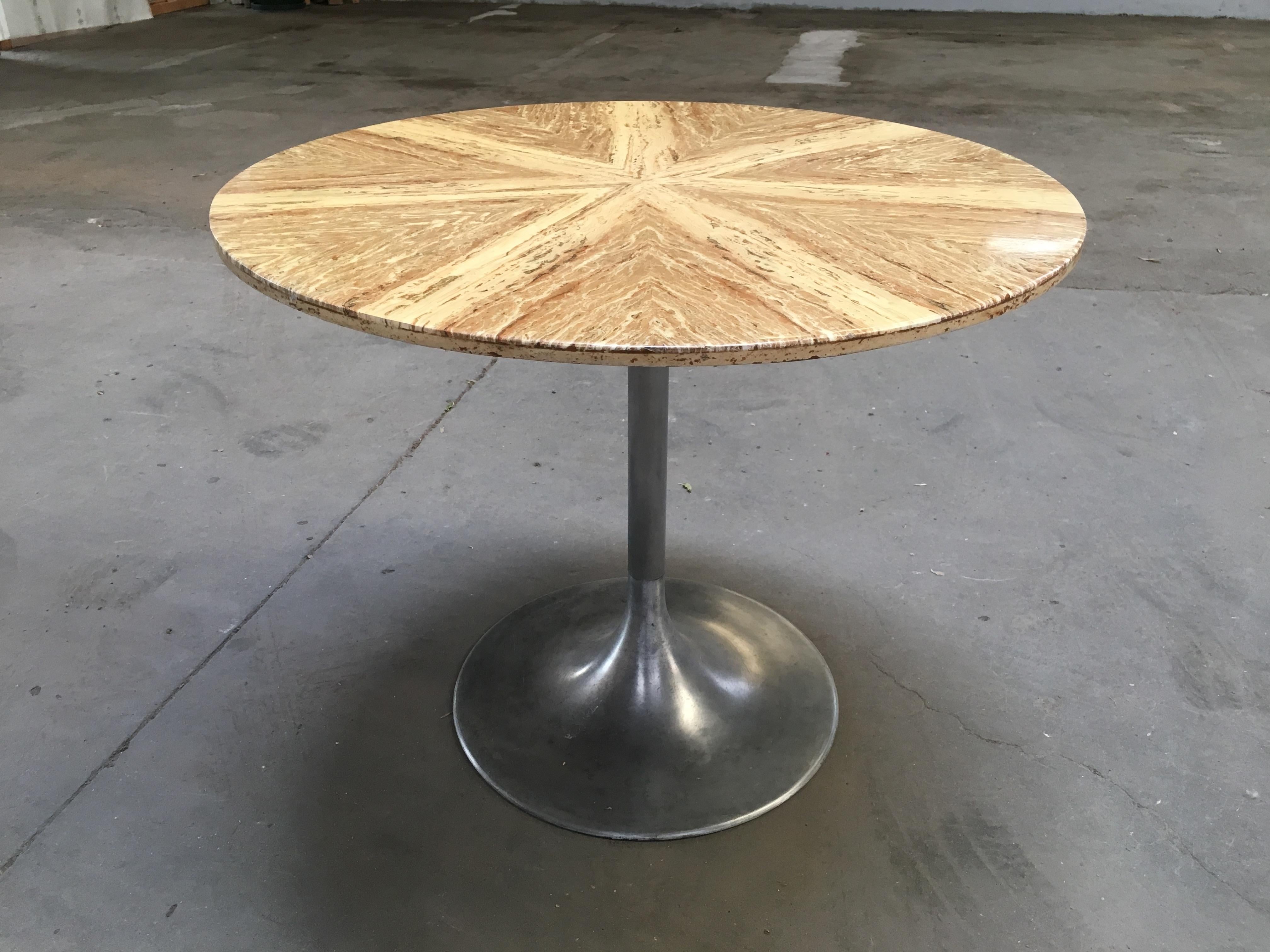 Mid-Century Modern Italian dining or center table with yellow Persian Travertino top and aluminum pedestal.