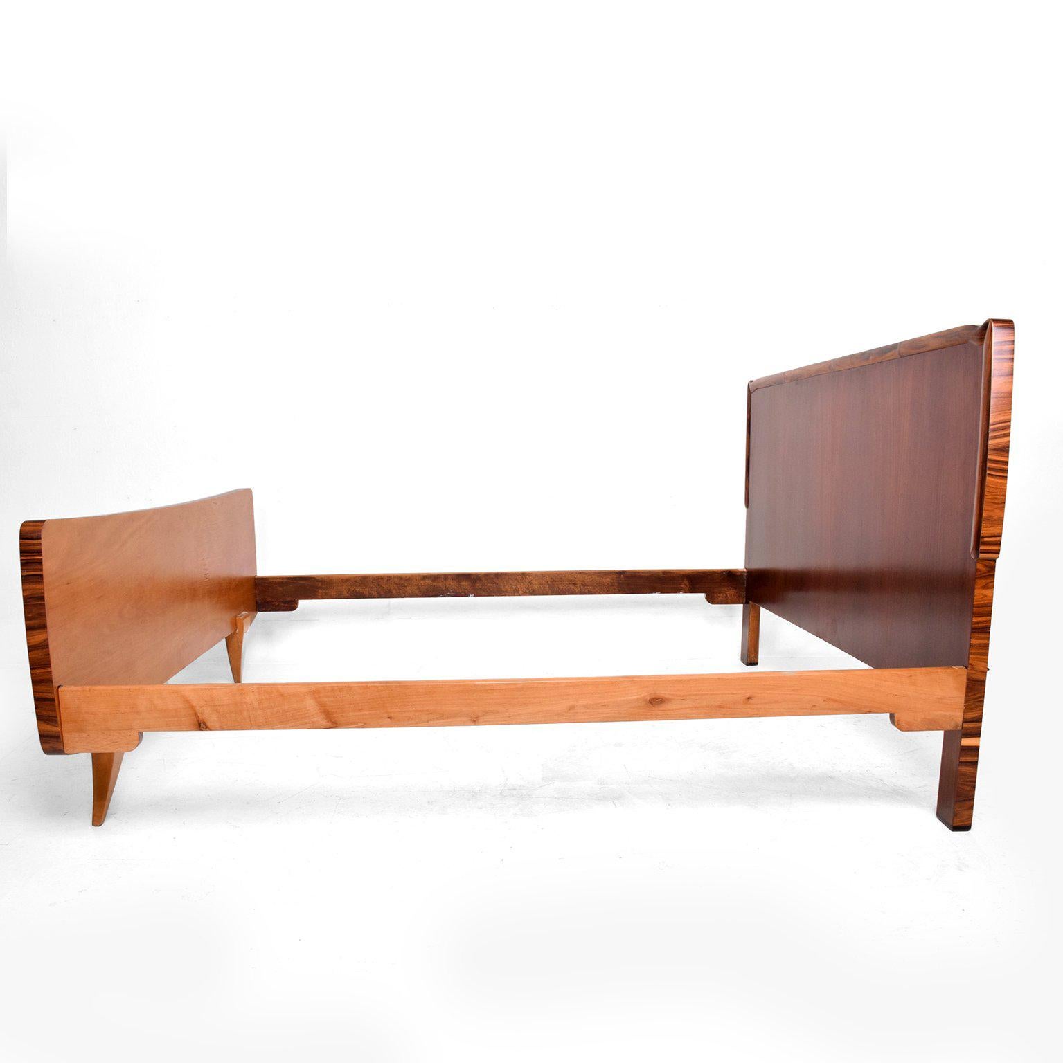 Elegant European Exotic Wood Mid-Century Modern Italian Bed Frame ITALY 1950s
No maker label visible. Designed in the style of Osvaldo Borsani. 
Features Exotic Wood selection of Burlwood, Macassar, Ebony, Rosewood and Maple.
European beds have