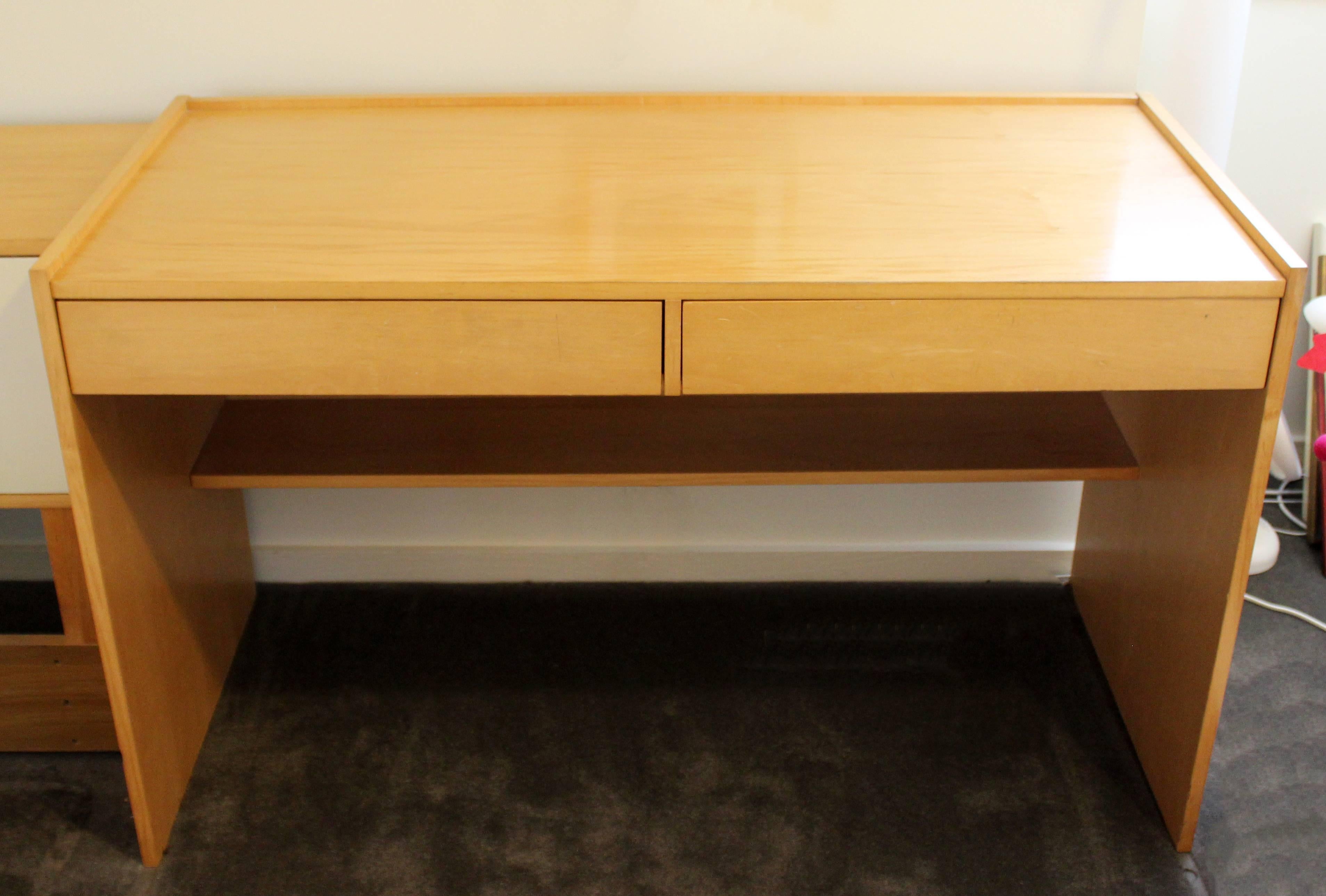 For your consideration is a beautiful, maple desk, with two drawers and a shelf, by Jack Cartwright for Founders, circa 1960s. In very good condition. The dimensions are 48