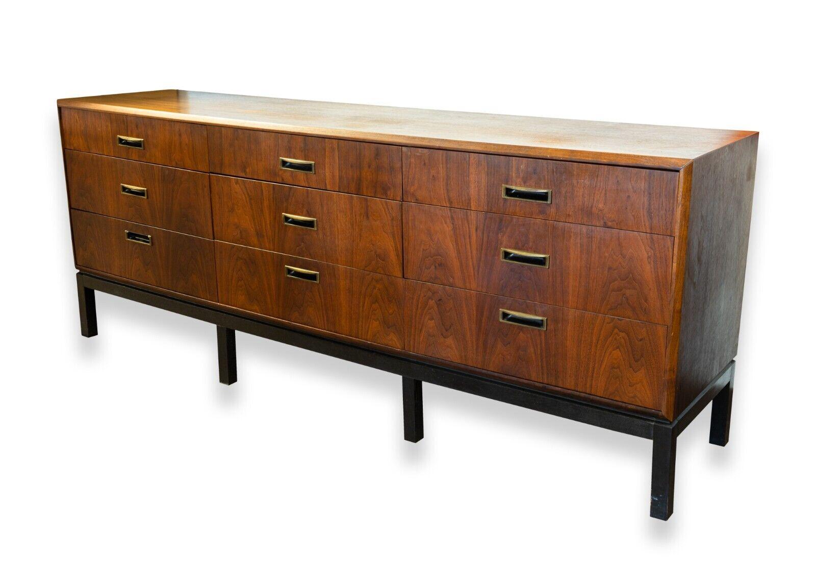 A Jack Cartwright for Founders credenza, dresser & mirrors set. A gorgeous set of furniture from designer Jack Cartwright. This fantastic set includes a matching dresser and credenza, as well as two duplicate mirrors. The dresser measures 30.5 in