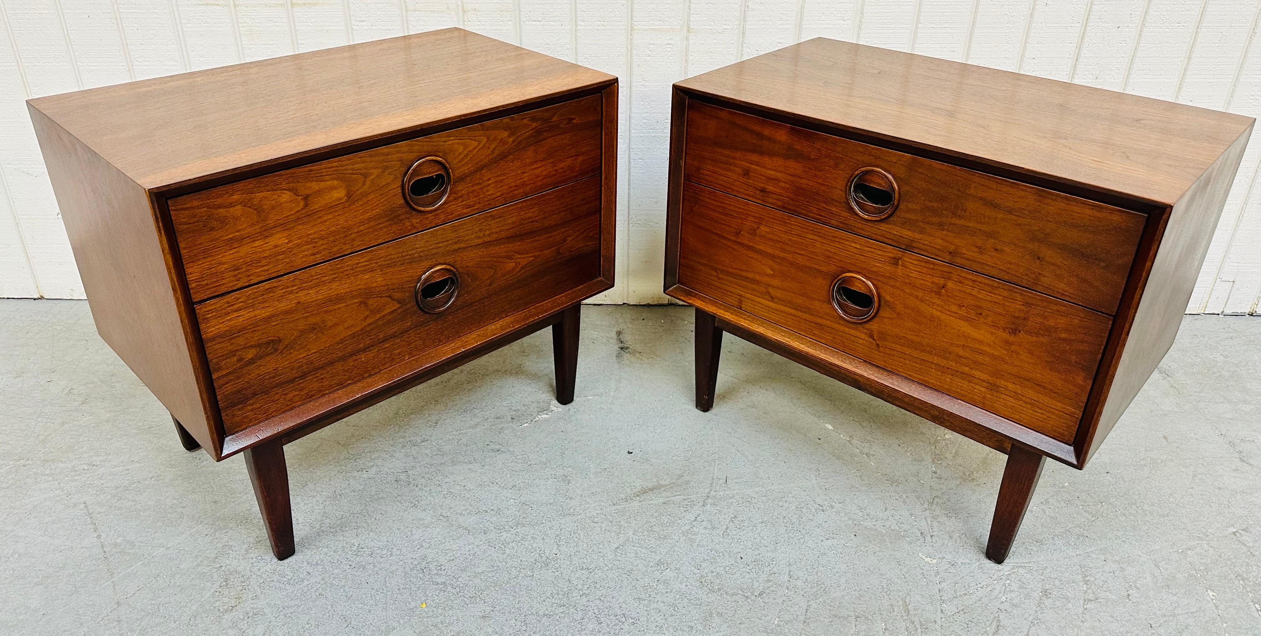 This listing is for a pair of Mid-Century Modern Walnut Nightstands attributed to designer Jack Cartwright. Featuring two drawers for storage, round sculpted walnut pulls, and a beautiful walnut finish. This is an exceptional combination of quality