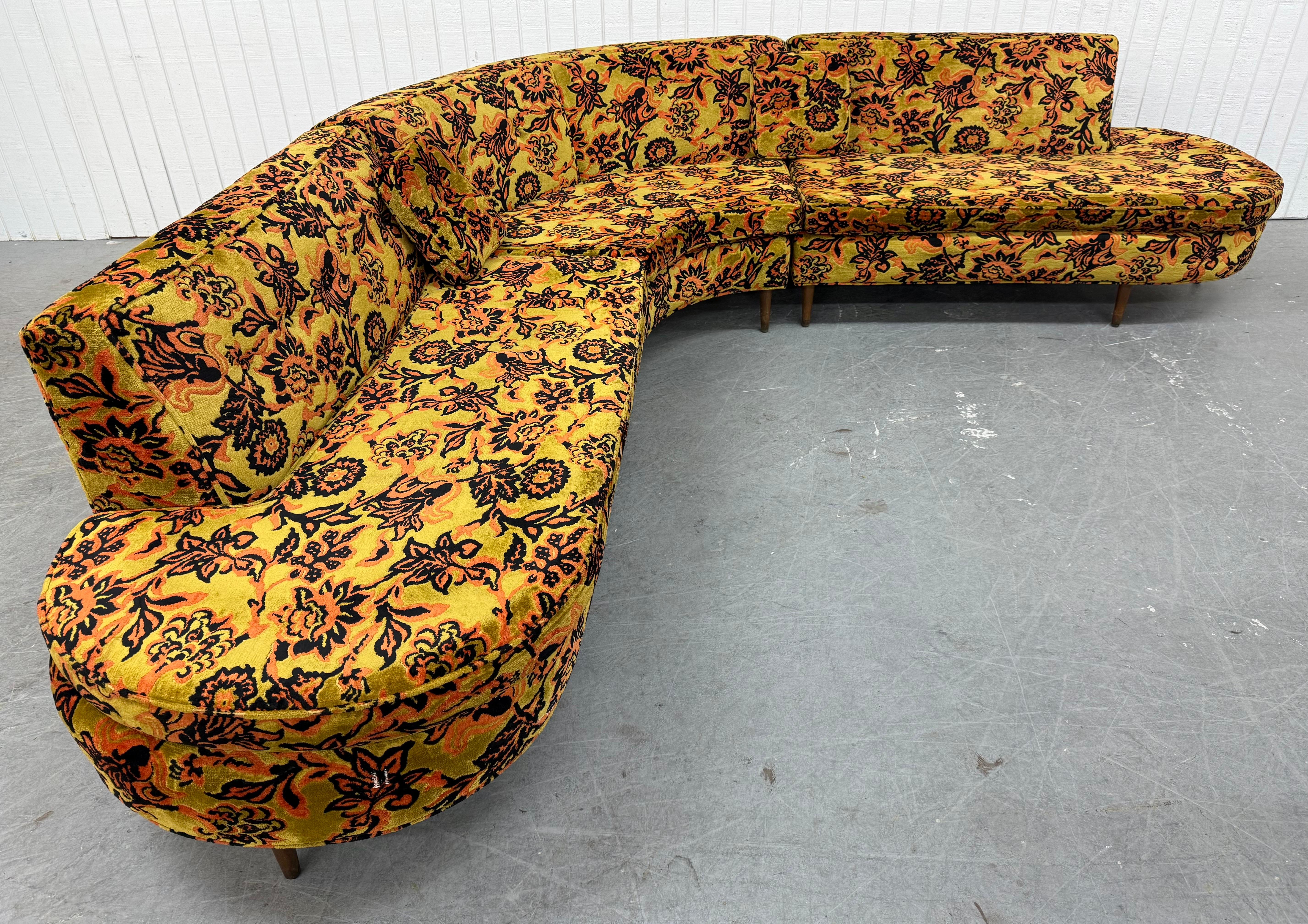 This listing is for a Mid-Century Modern Jack Larsen Style Sectional Sofa. Featuring a serpentine style design, three pieces that come together, original floral Jack Larsen style upholstery, and modern walnut legs. This is an exceptional combination